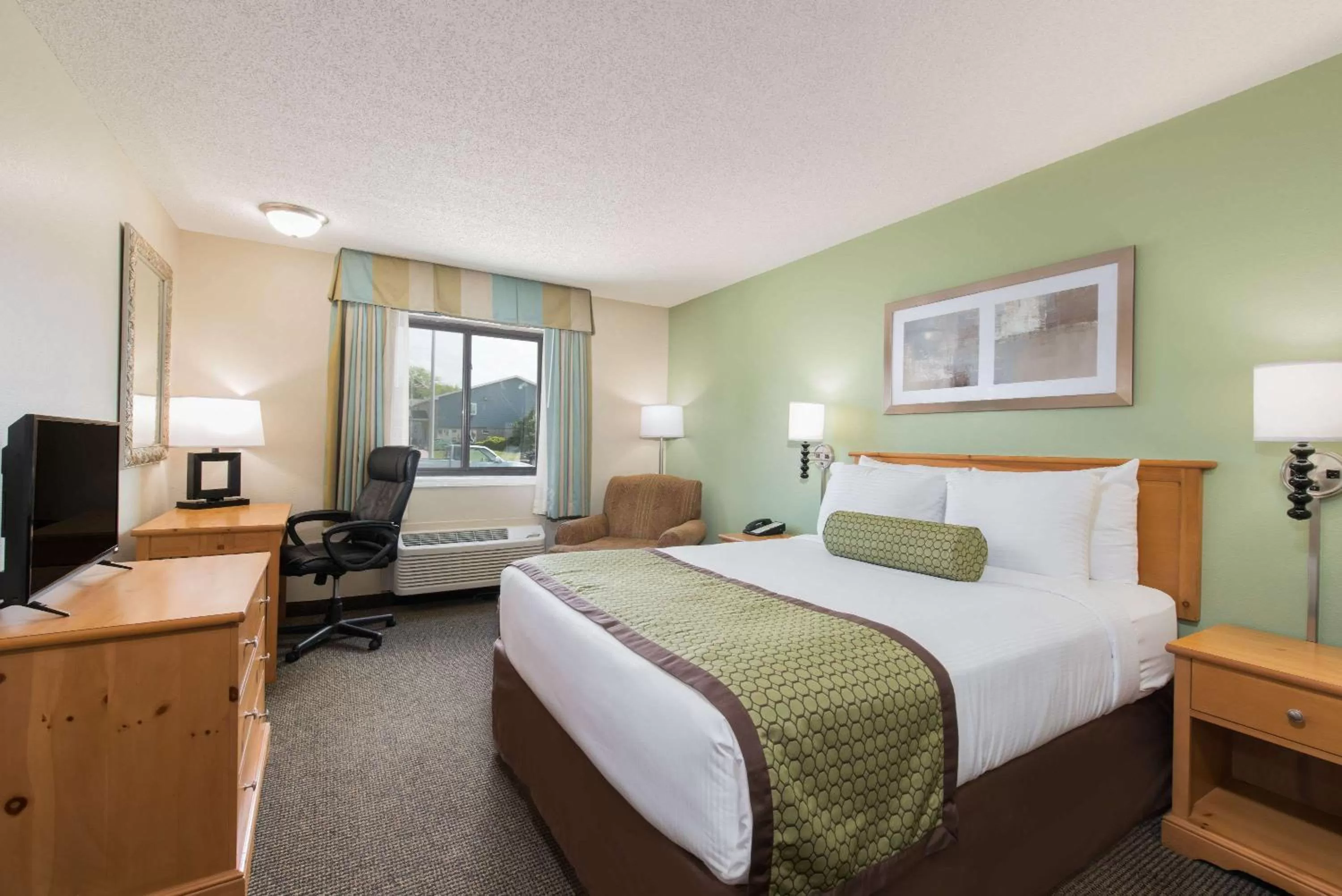 Photo of the whole room, Bed in Baymont by Wyndham Pierre