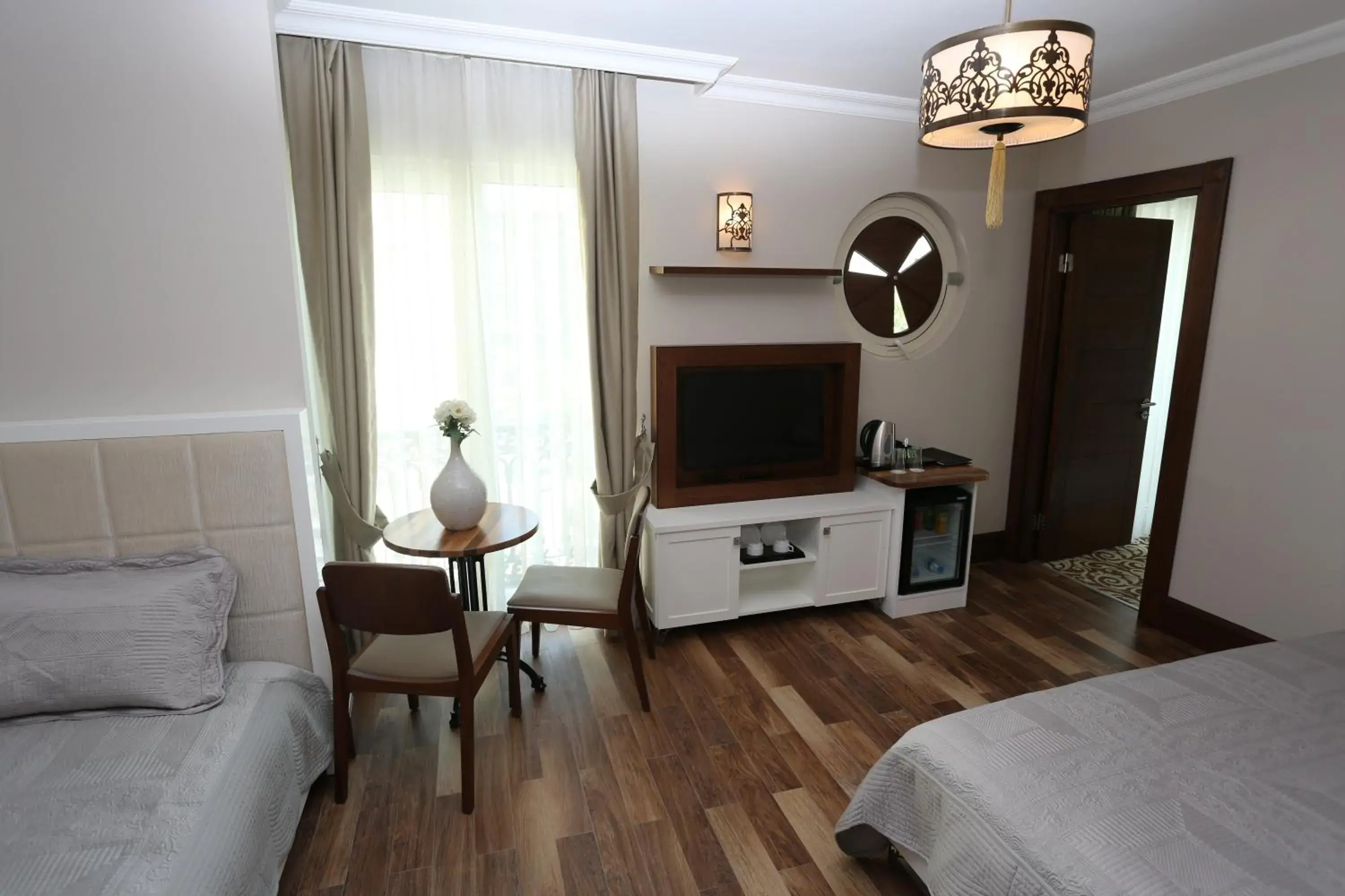 Bedroom, Seating Area in K Suites Hotel