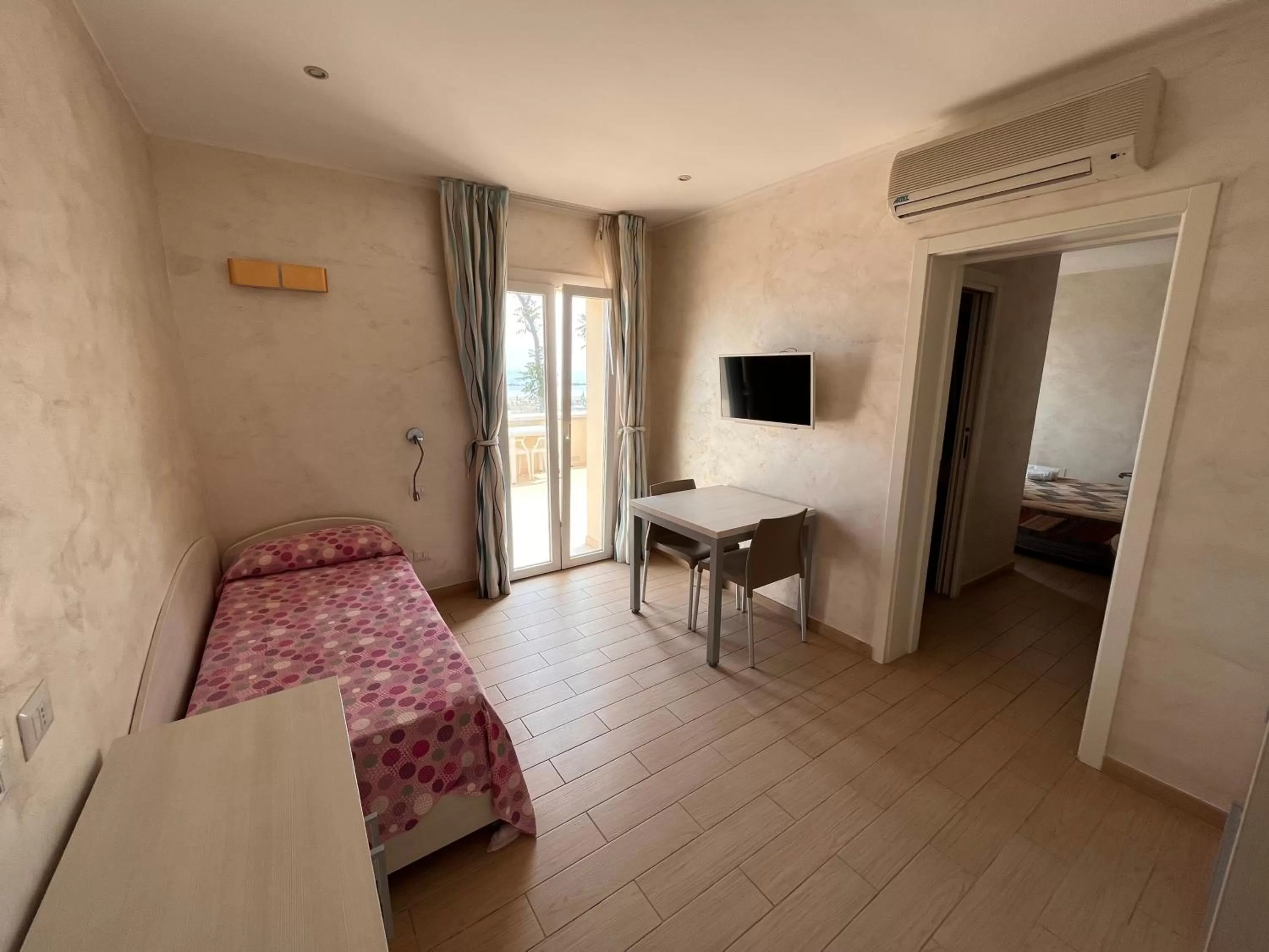 Living room, Seating Area in Marina Beach Suite Hotel