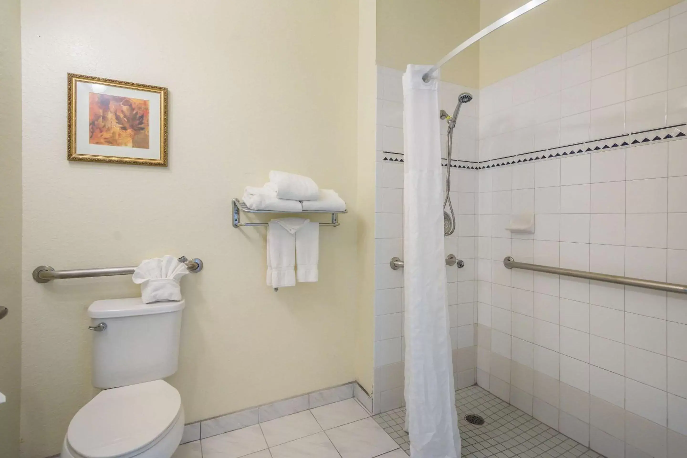 Photo of the whole room, Bathroom in Clarion Inn & Suites Central Clearwater Beach