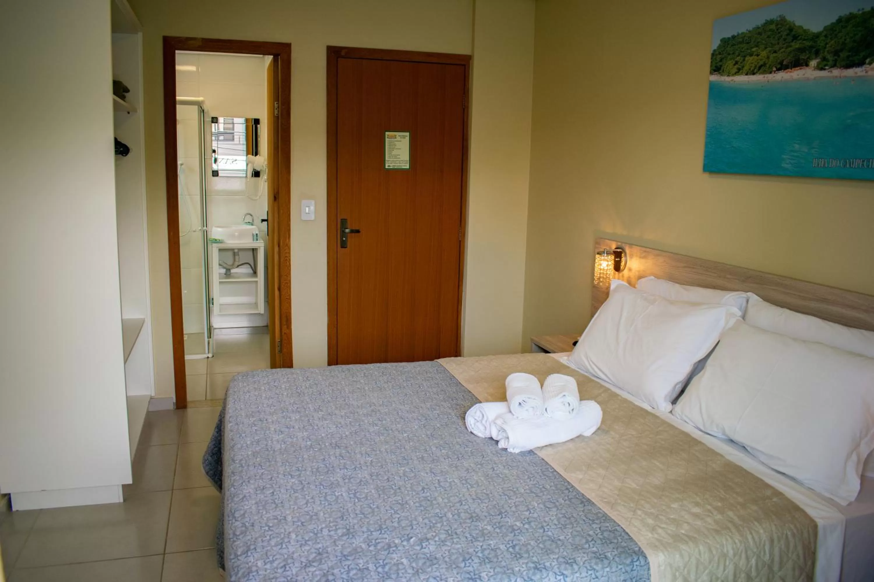 Bed in Pousada Tissiano