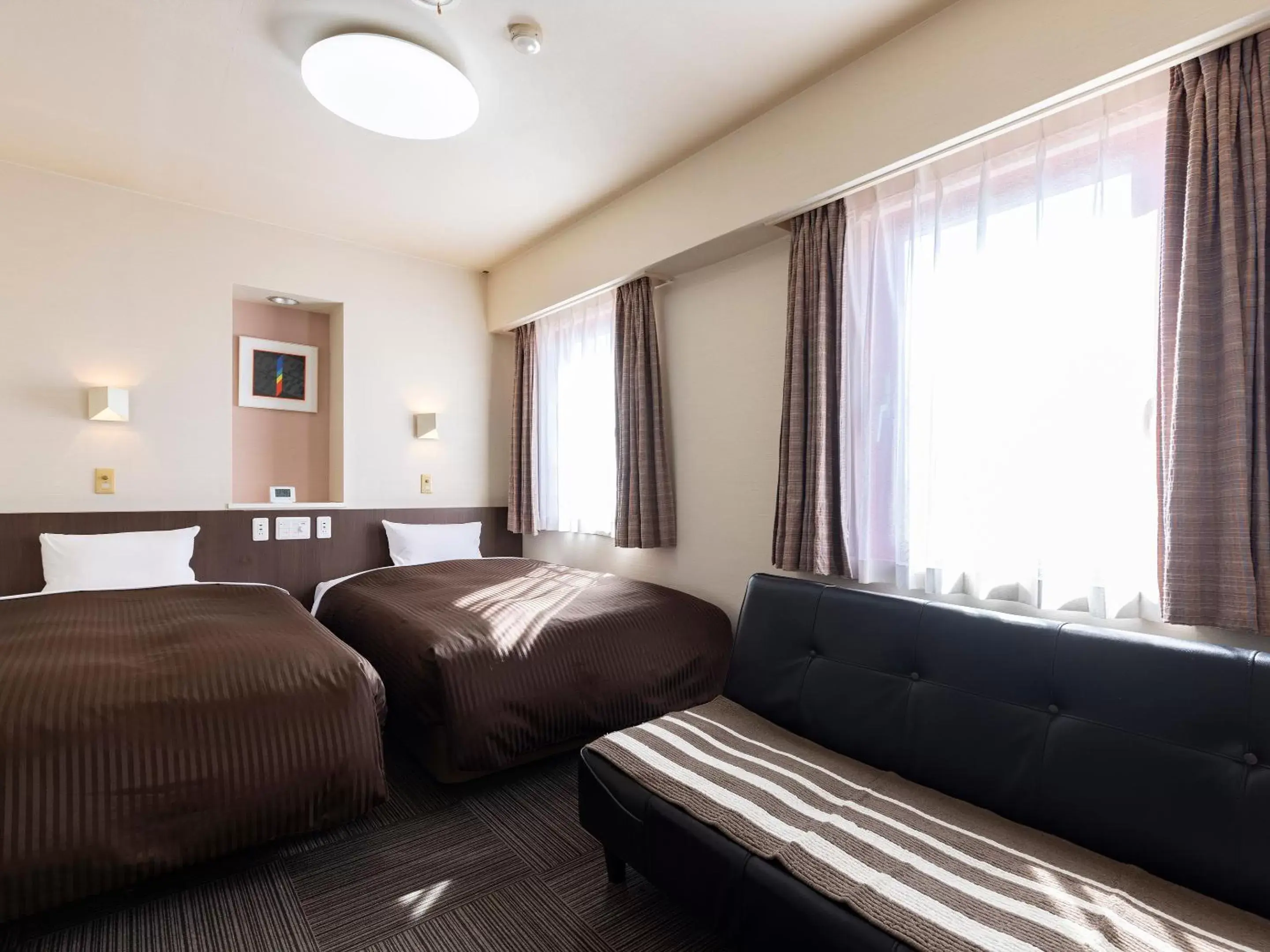 Photo of the whole room, Bed in Hotel Wing International Izumi