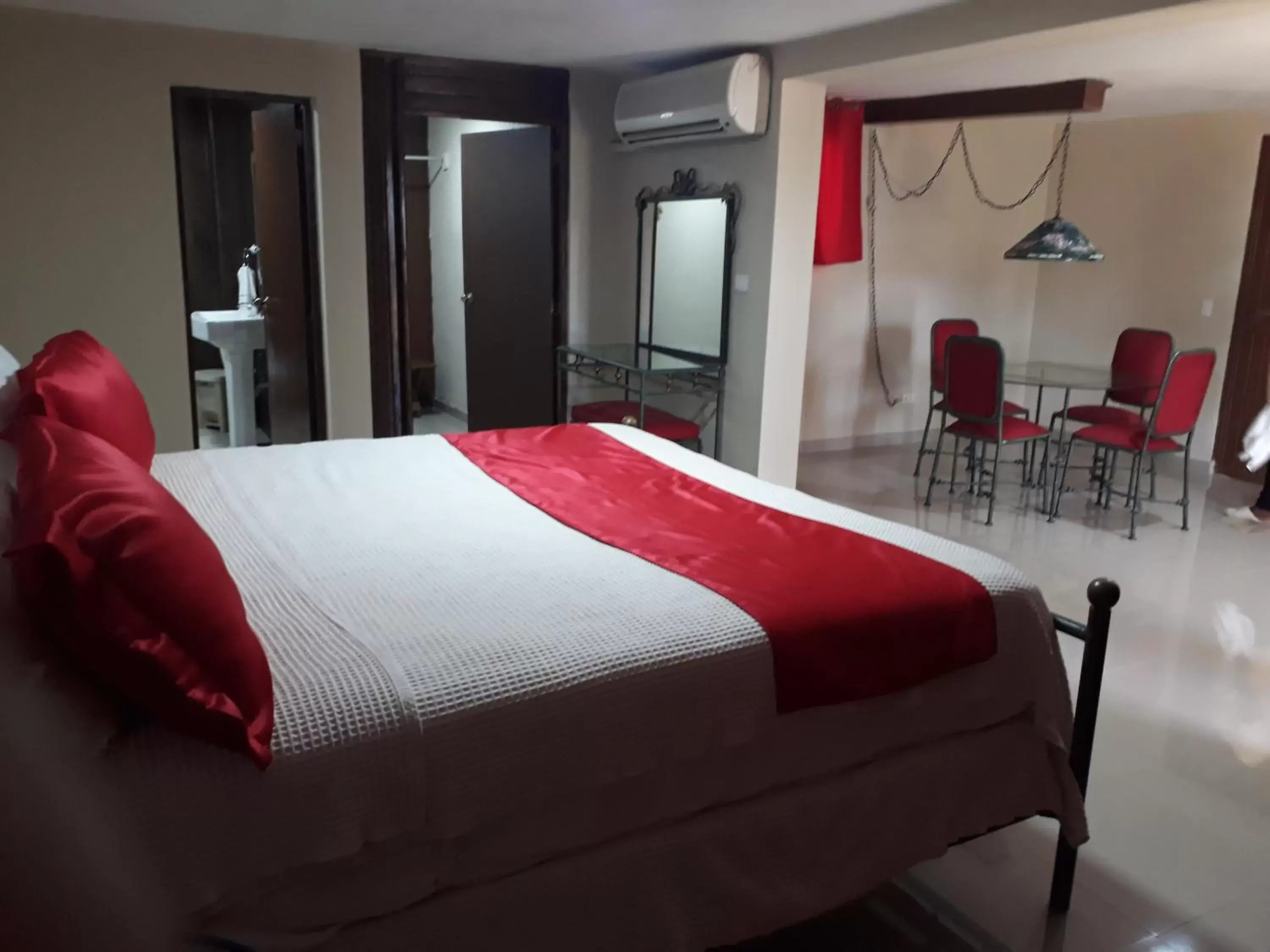 Suite King Bed and Sofa Bed in Hotel Olimpo Suite King Bed and Sofa Bed in Hotel Olimpo