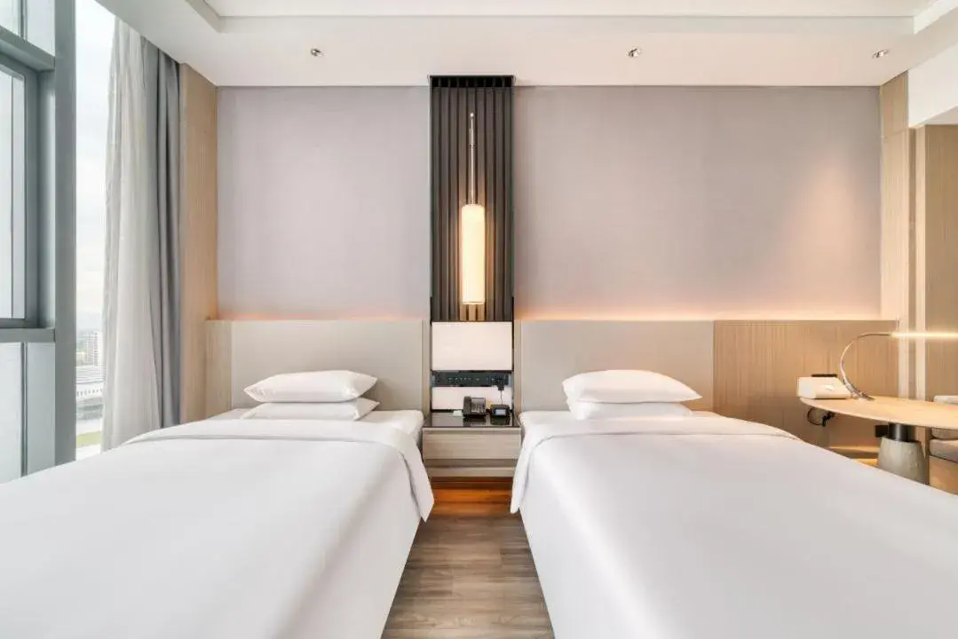 Bed in Courtyard by Marriott Hangzhou Xihu