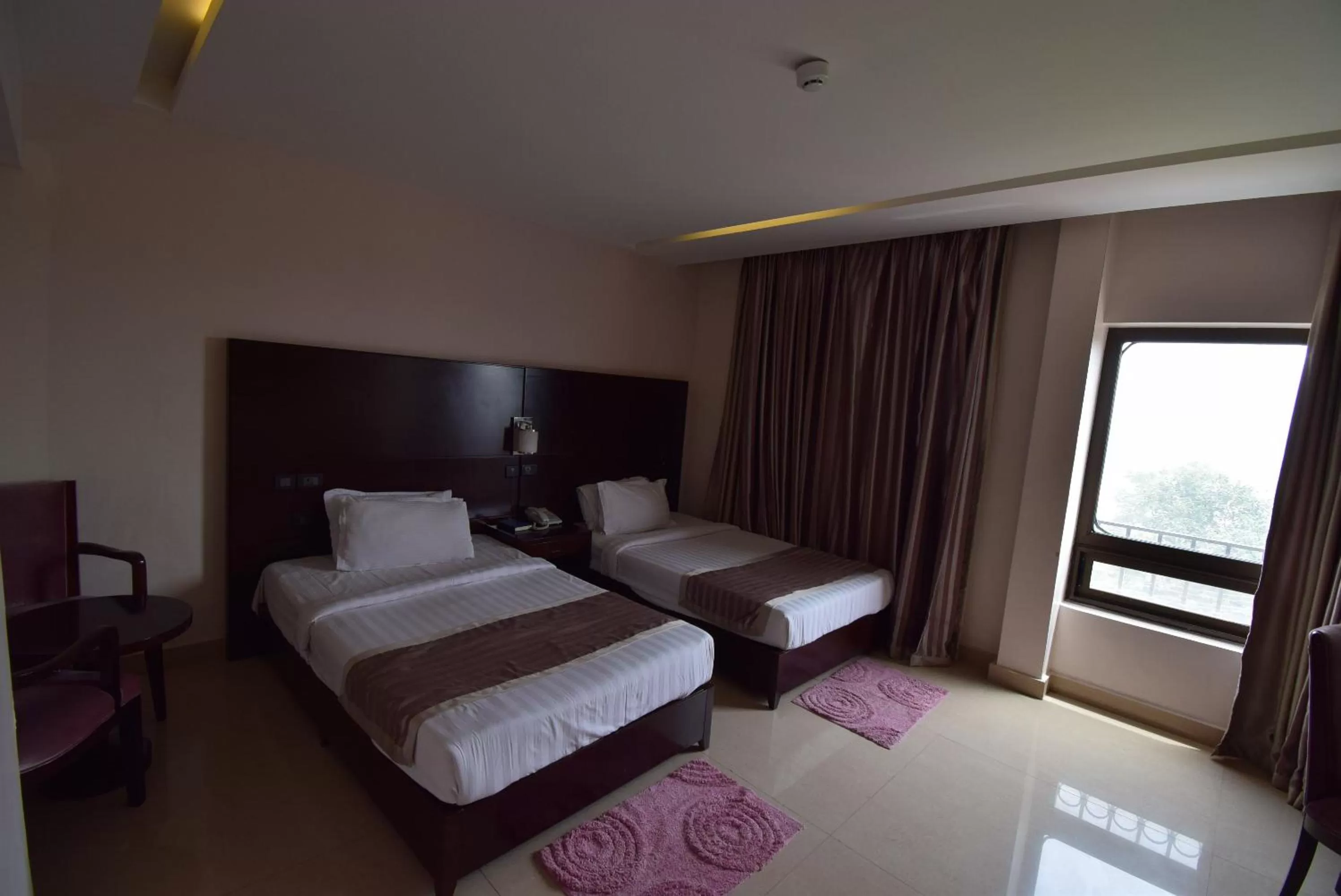 Photo of the whole room, Bed in Noble House Hotel
