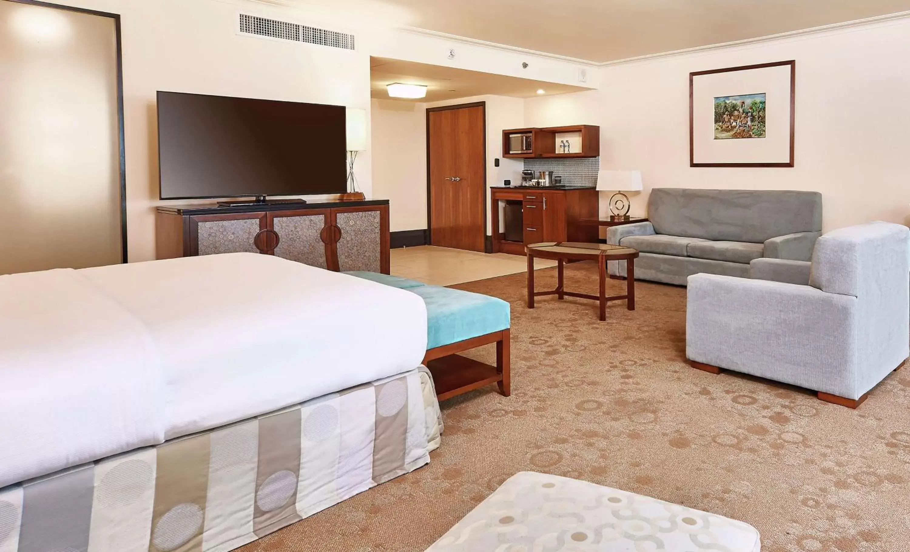 Bed, TV/Entertainment Center in Hilton Trinidad & Conference Centre