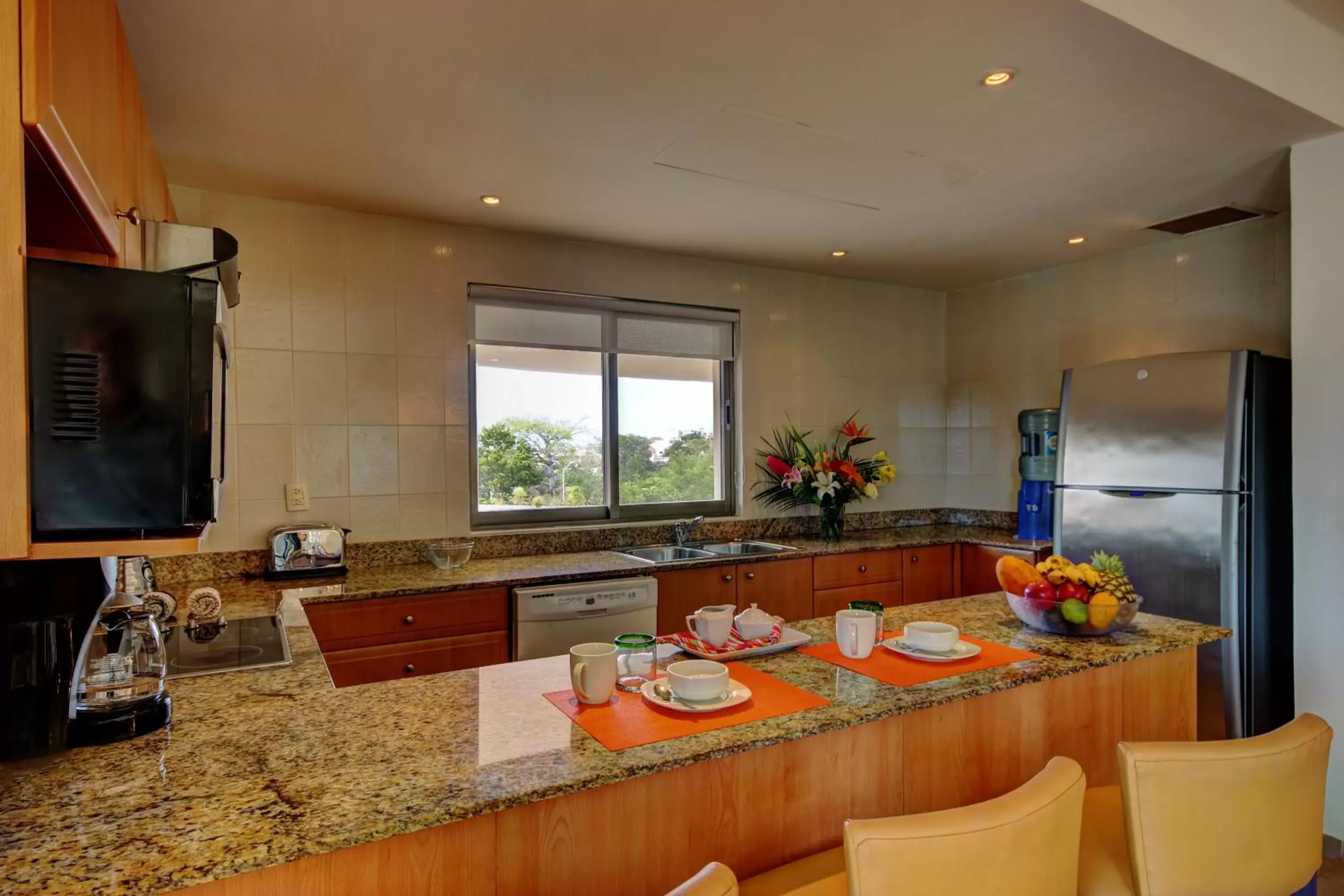 Kitchen or kitchenette in Riviera Maya Suites