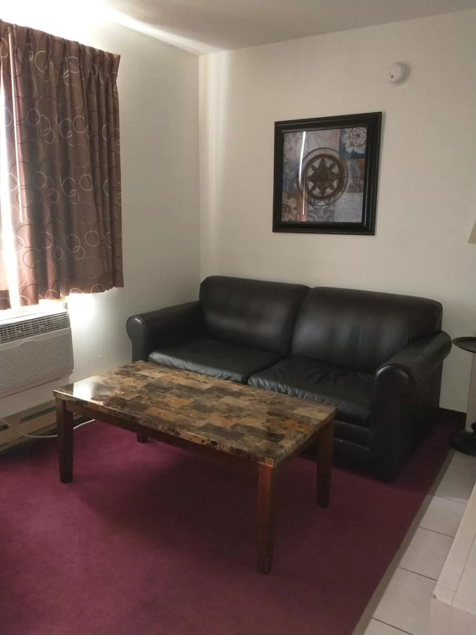 Seating area in Sauk River Inn & Suites, a Travelodge by Wyndham