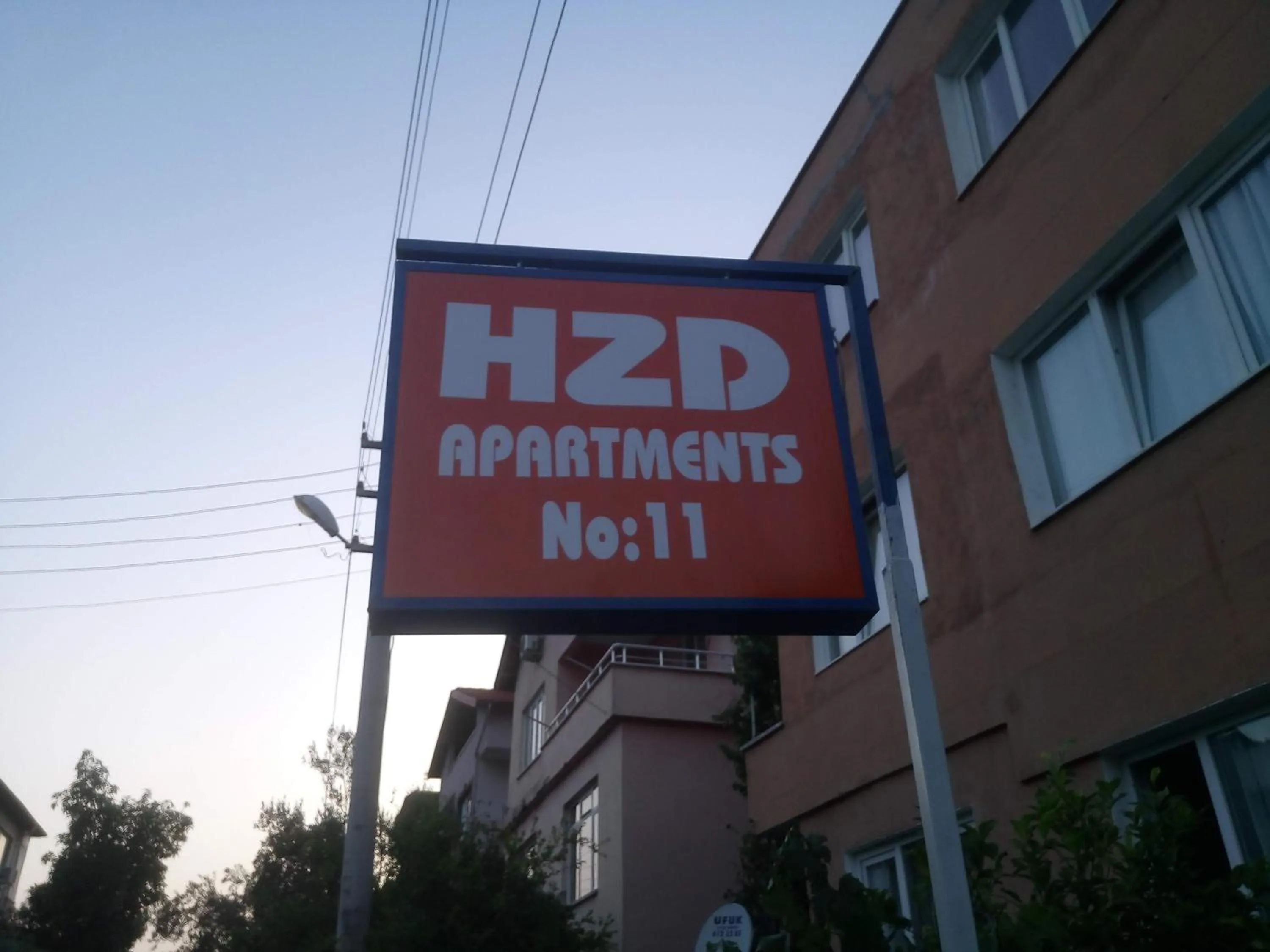 Property logo or sign in HZD Apartments Hostel