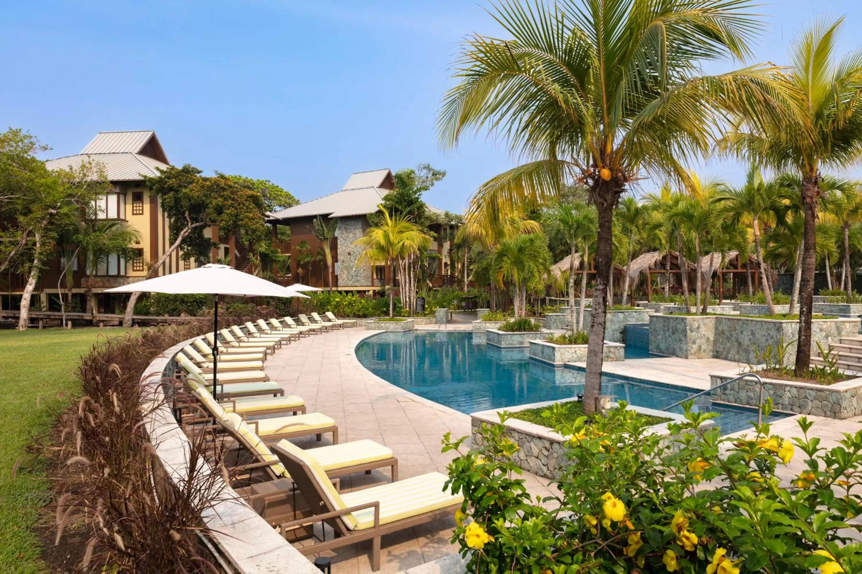 Pool view in Indura Beach & Golf Resort Curio Collection By Hilton