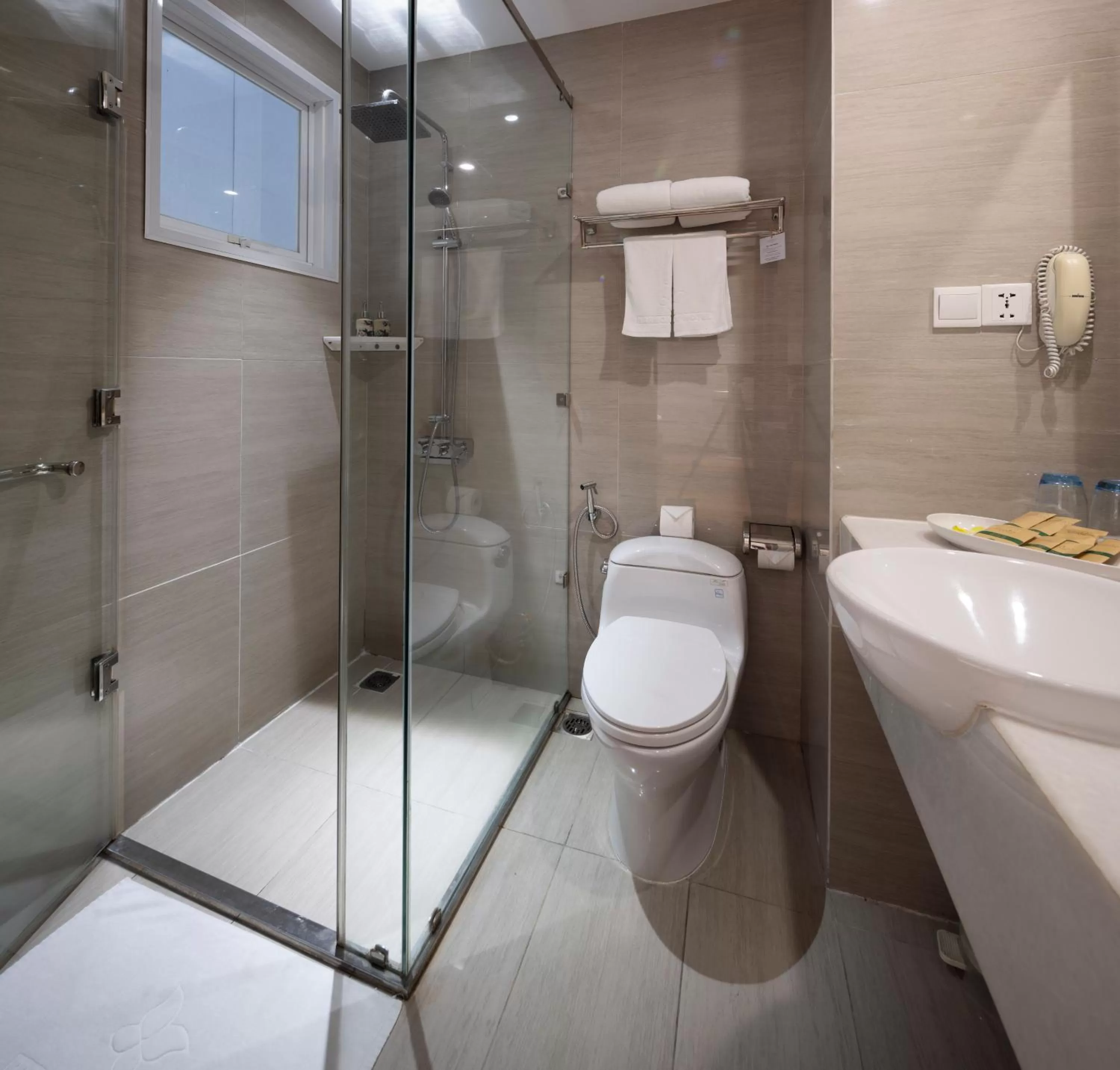 Toilet in Harmony Saigon Hotel & Spa