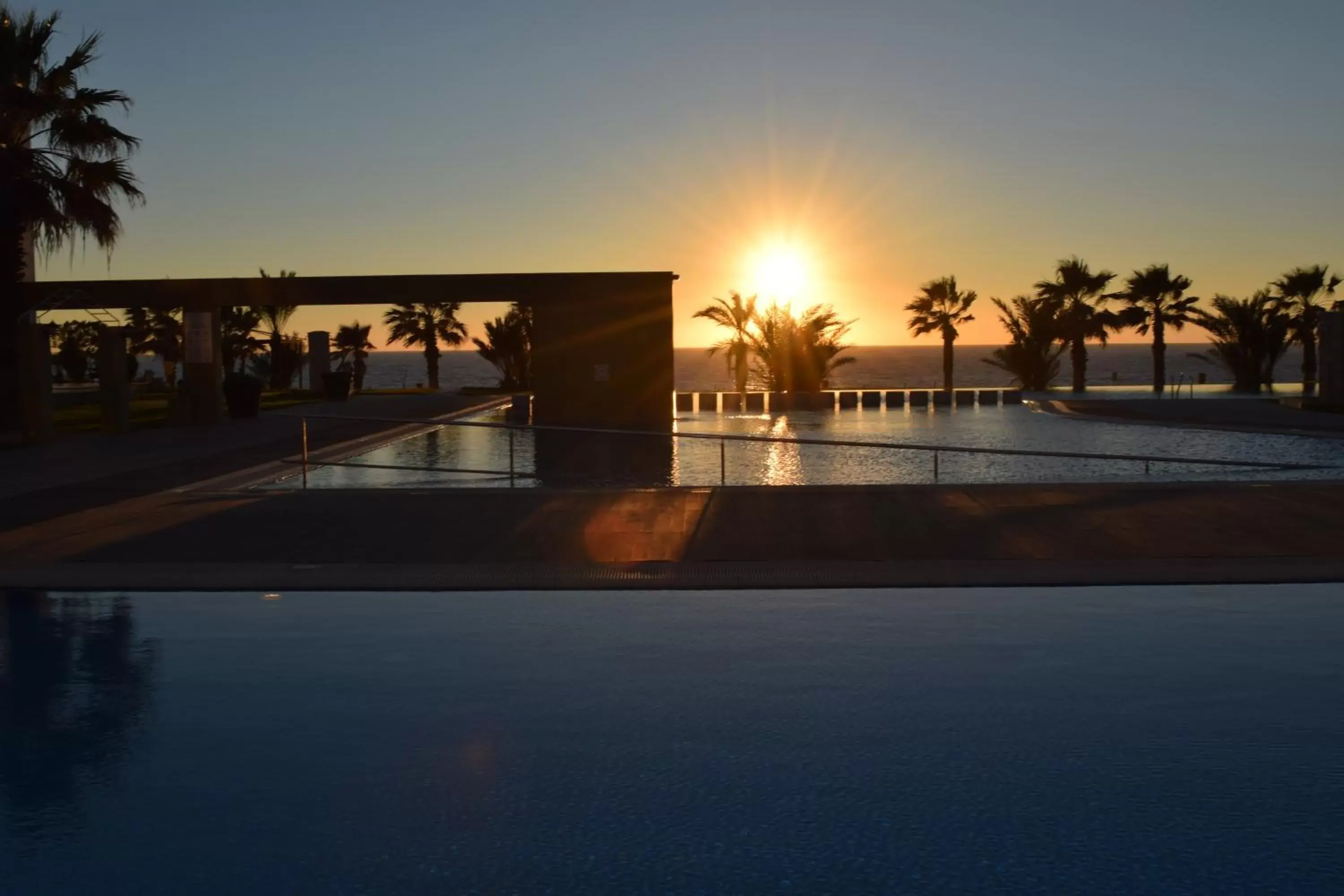 Swimming pool, Sunrise/Sunset in Capital Coast Resort And Spa