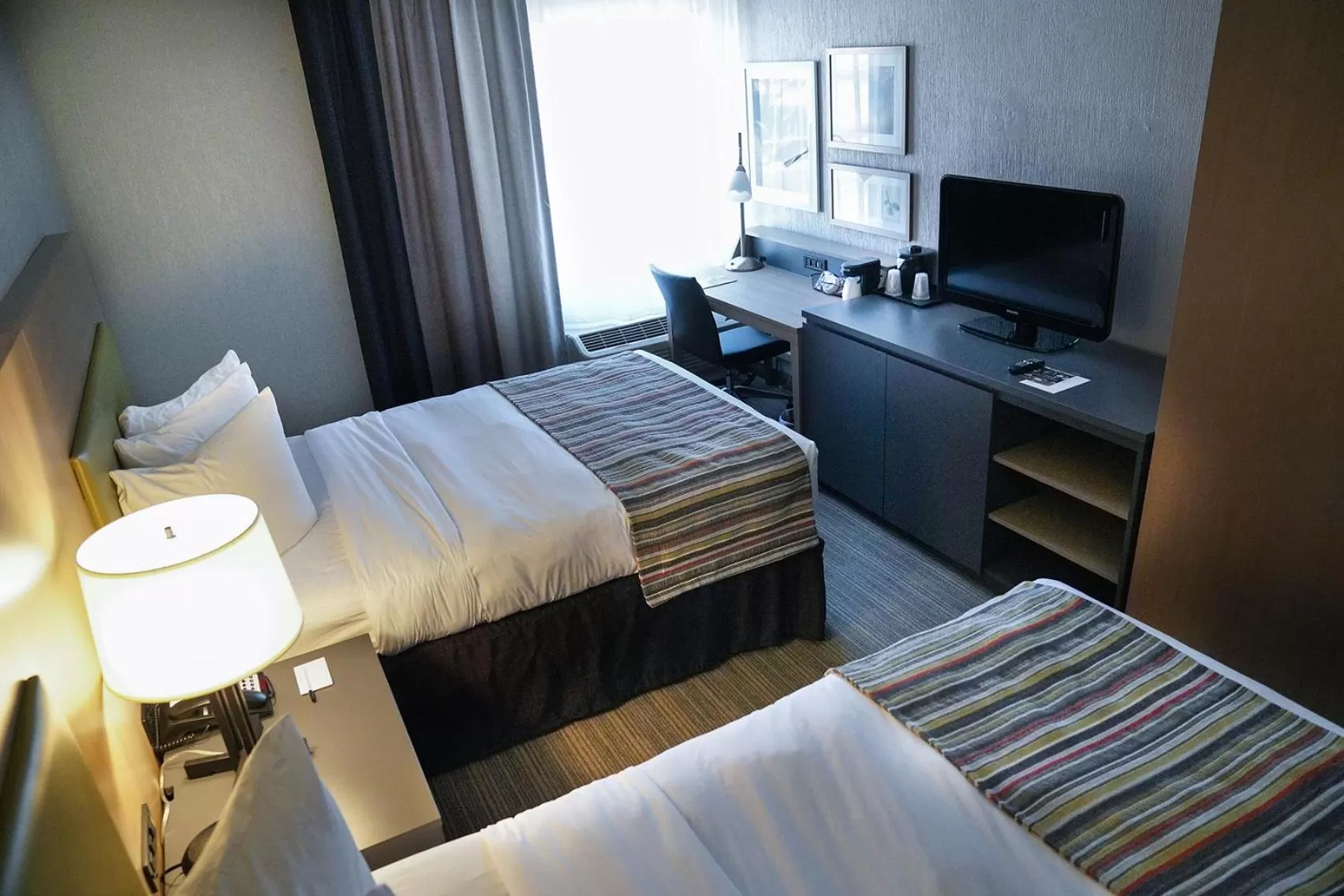 Photo of the whole room, TV/Entertainment Center in Country Inn & Suites by Radisson, Grand Prairie-DFW-Arlington, TX