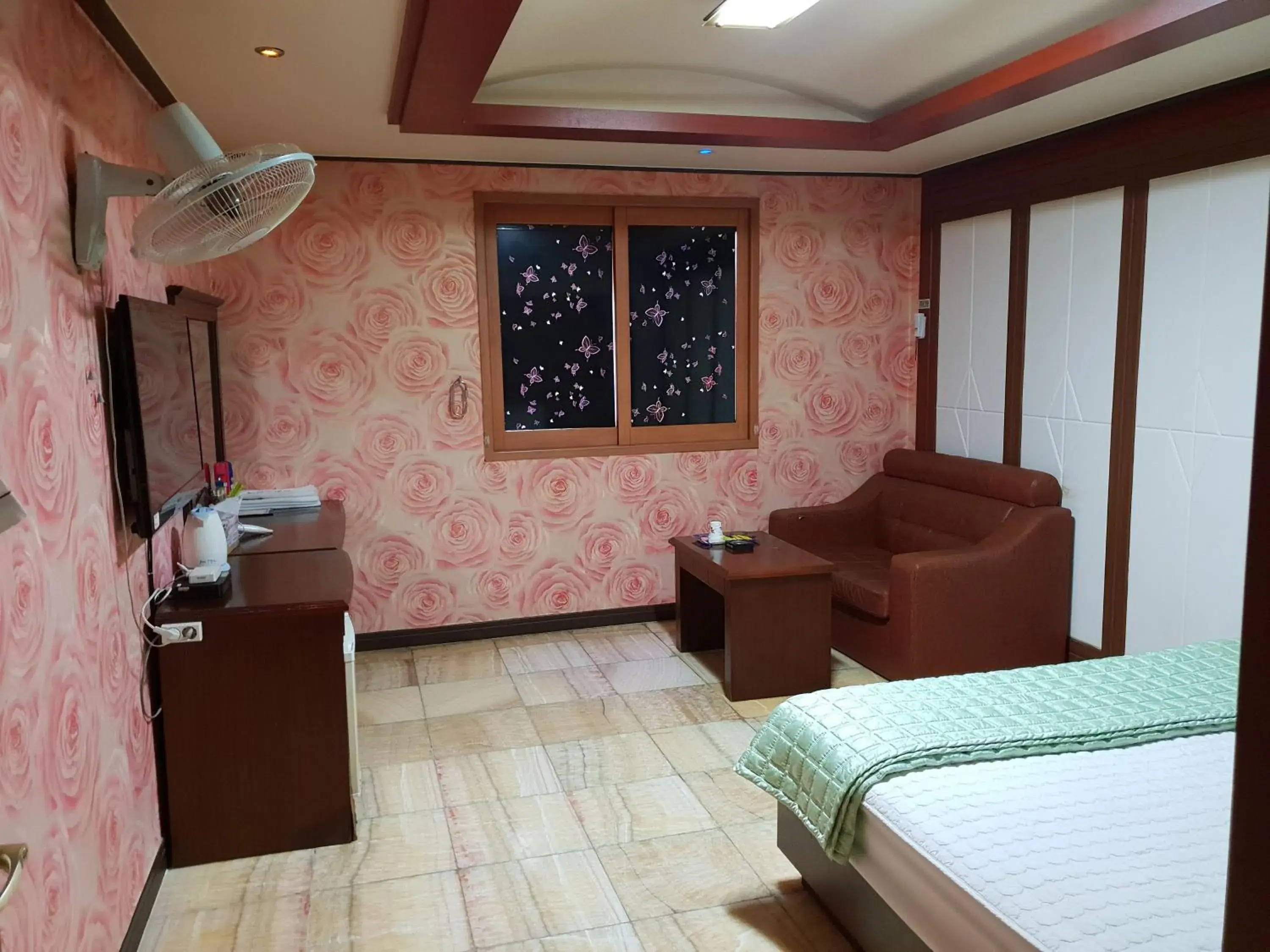 Bed, Seating Area in Plus Motel
