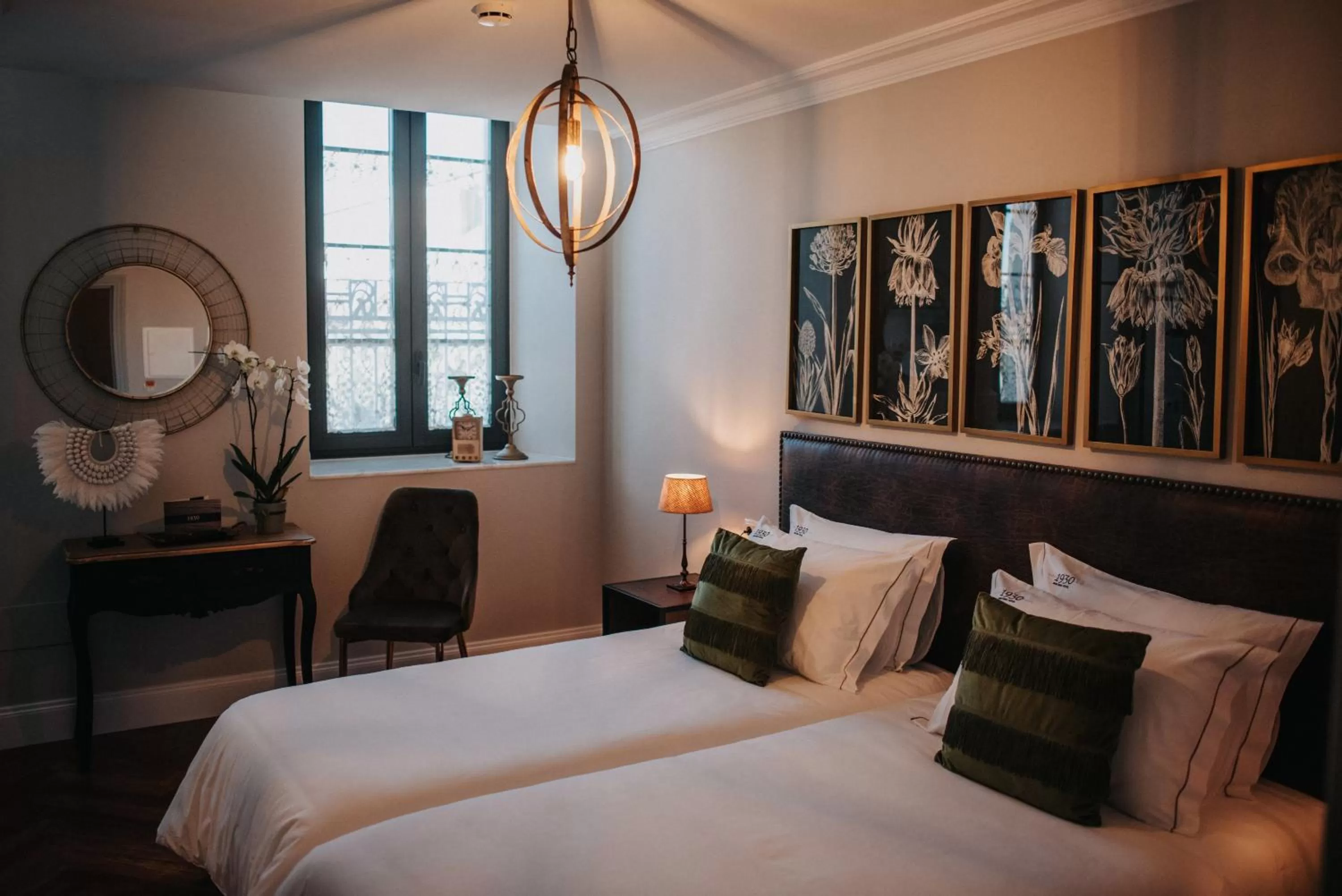 Bed in 1930 Boutique Hotel