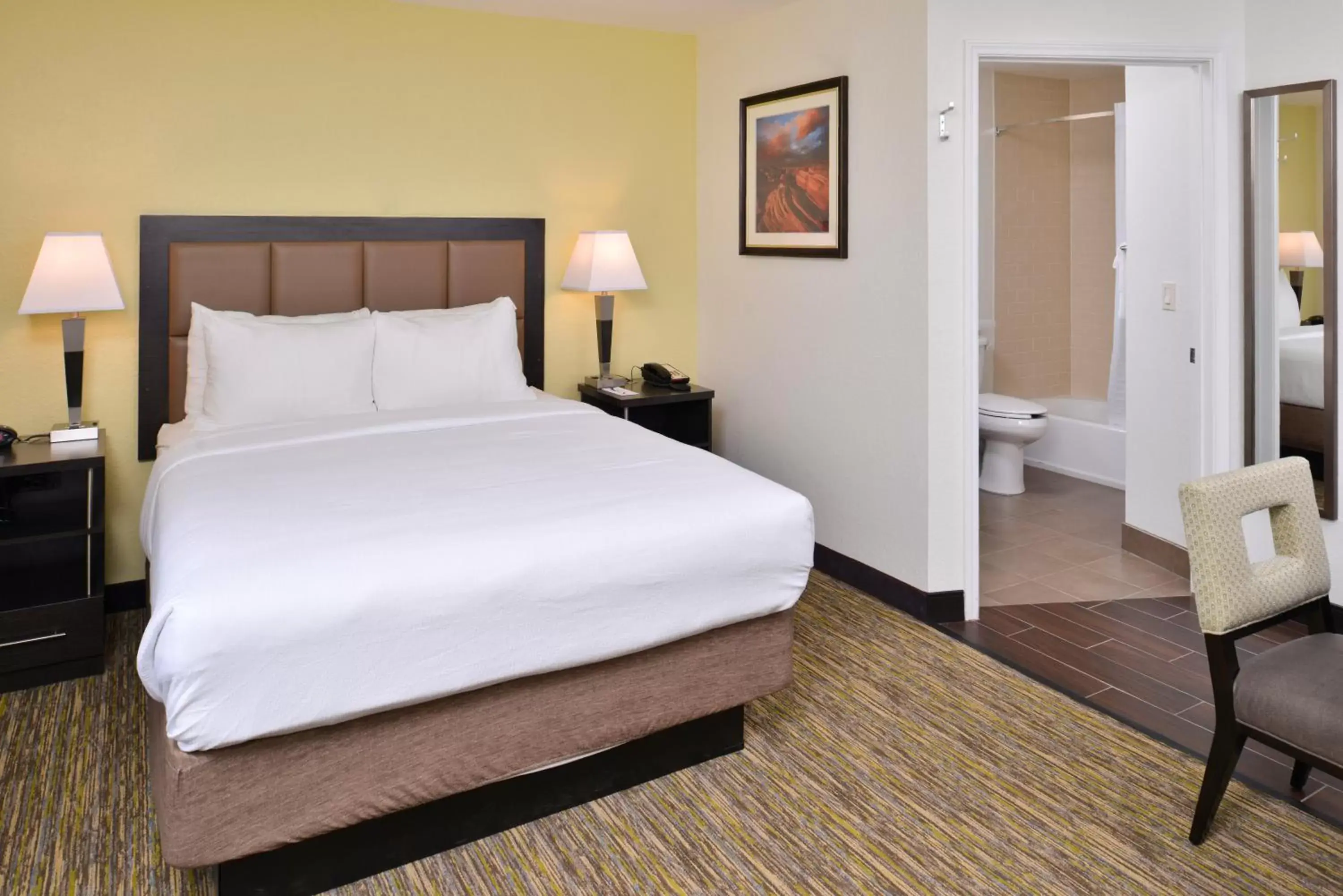 Photo of the whole room, Bed in Candlewood Suites Beaumont, an IHG Hotel