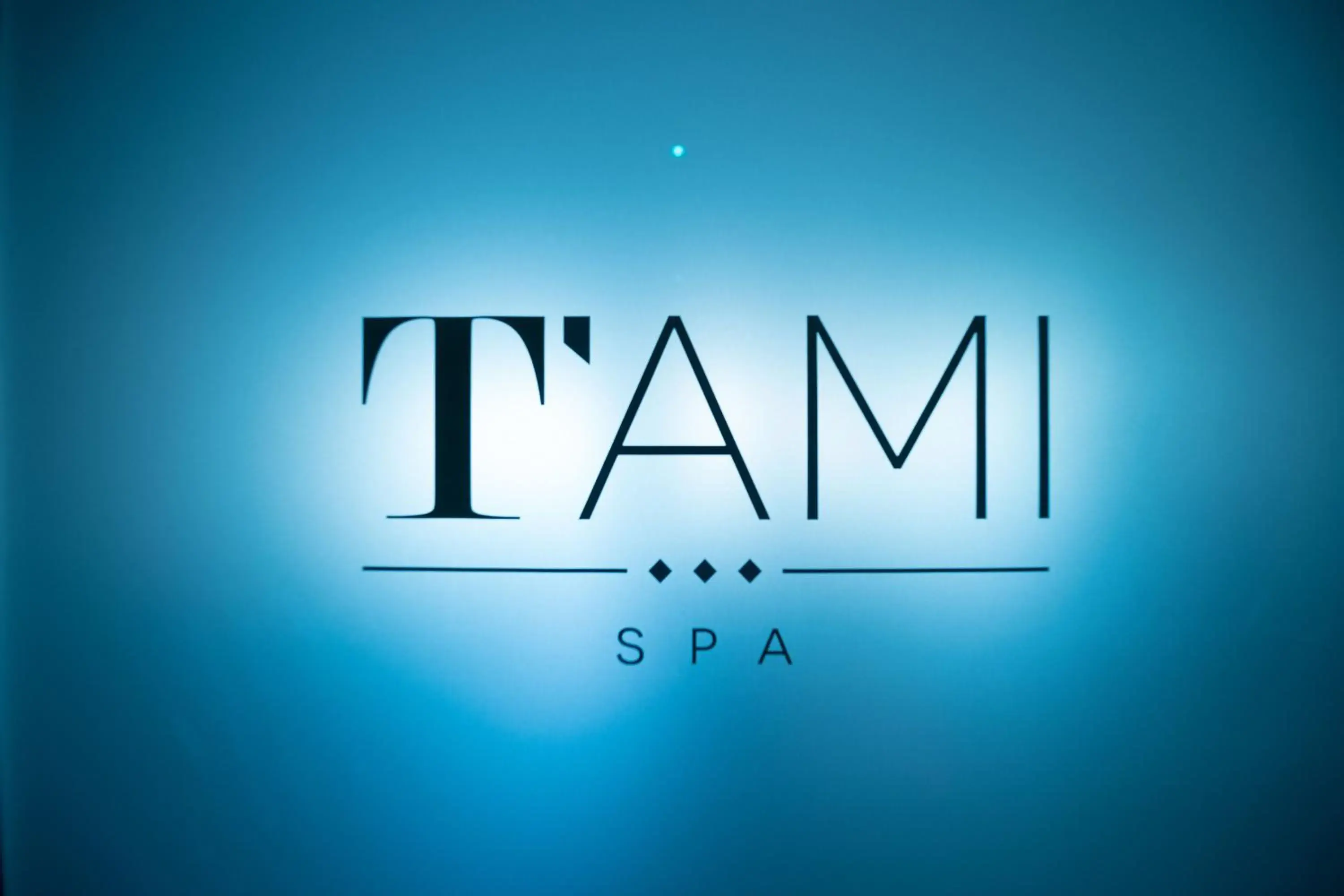 Property logo or sign in T'ami Hotel Resort Spa