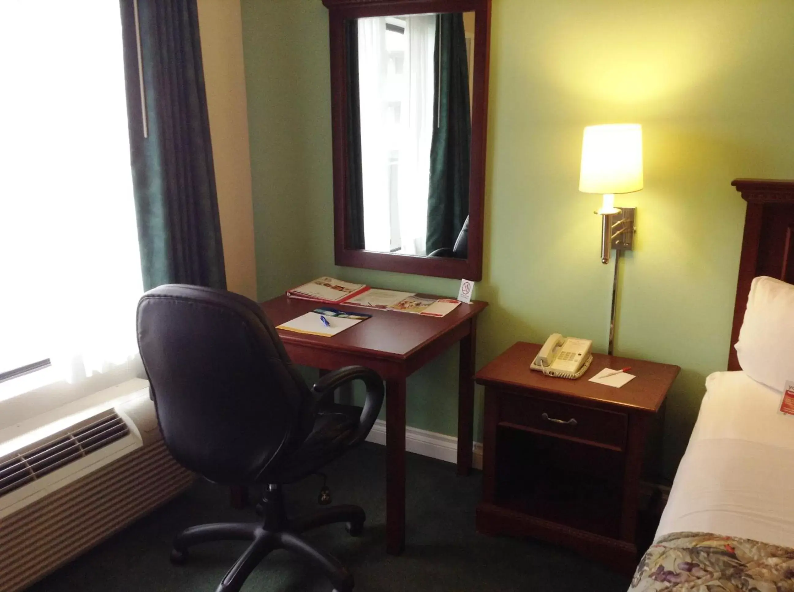 Seating area, TV/Entertainment Center in Ramada by Wyndham Oceanside