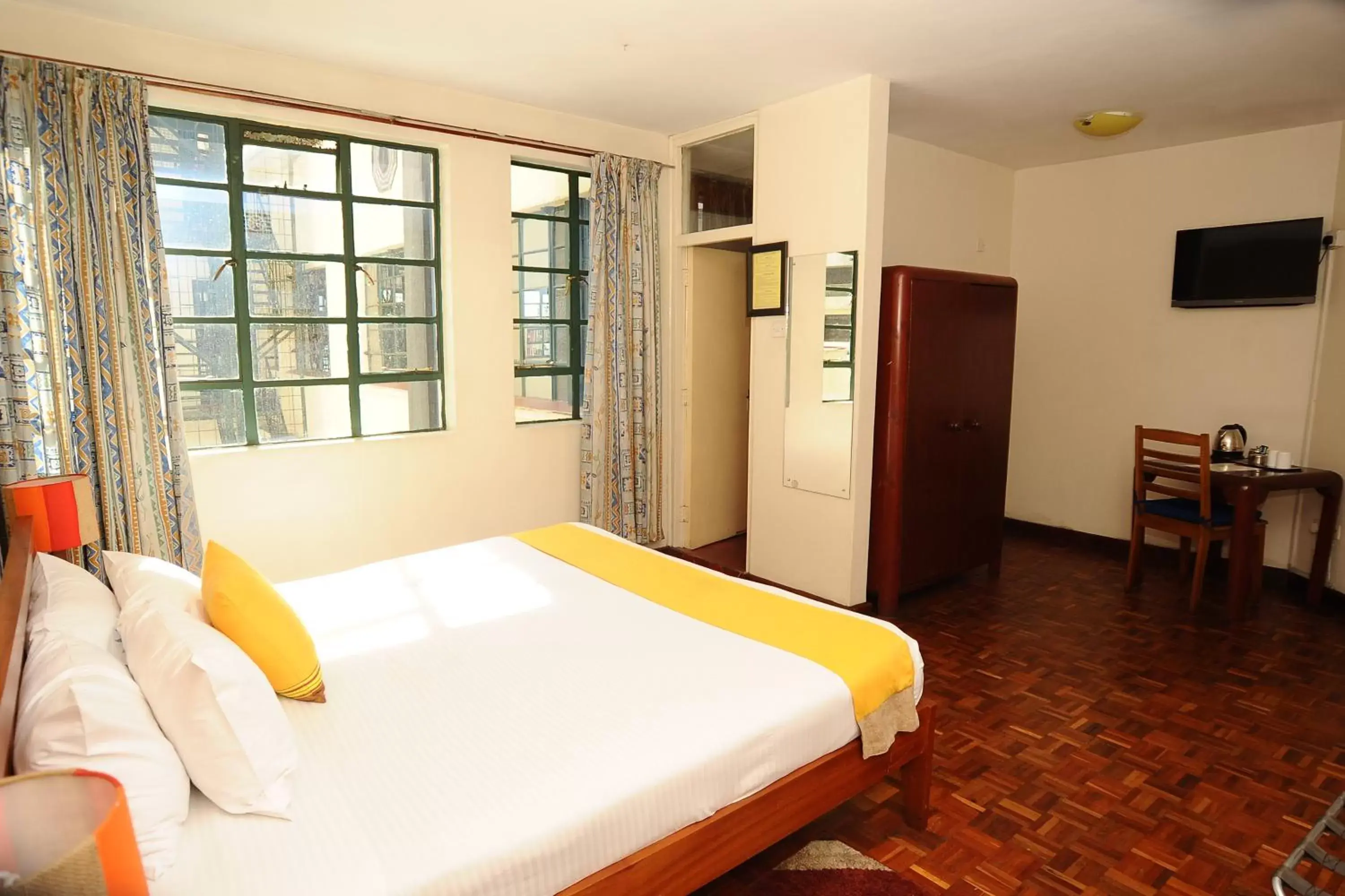 Photo of the whole room, Bed in Kenya Comfort Hotel