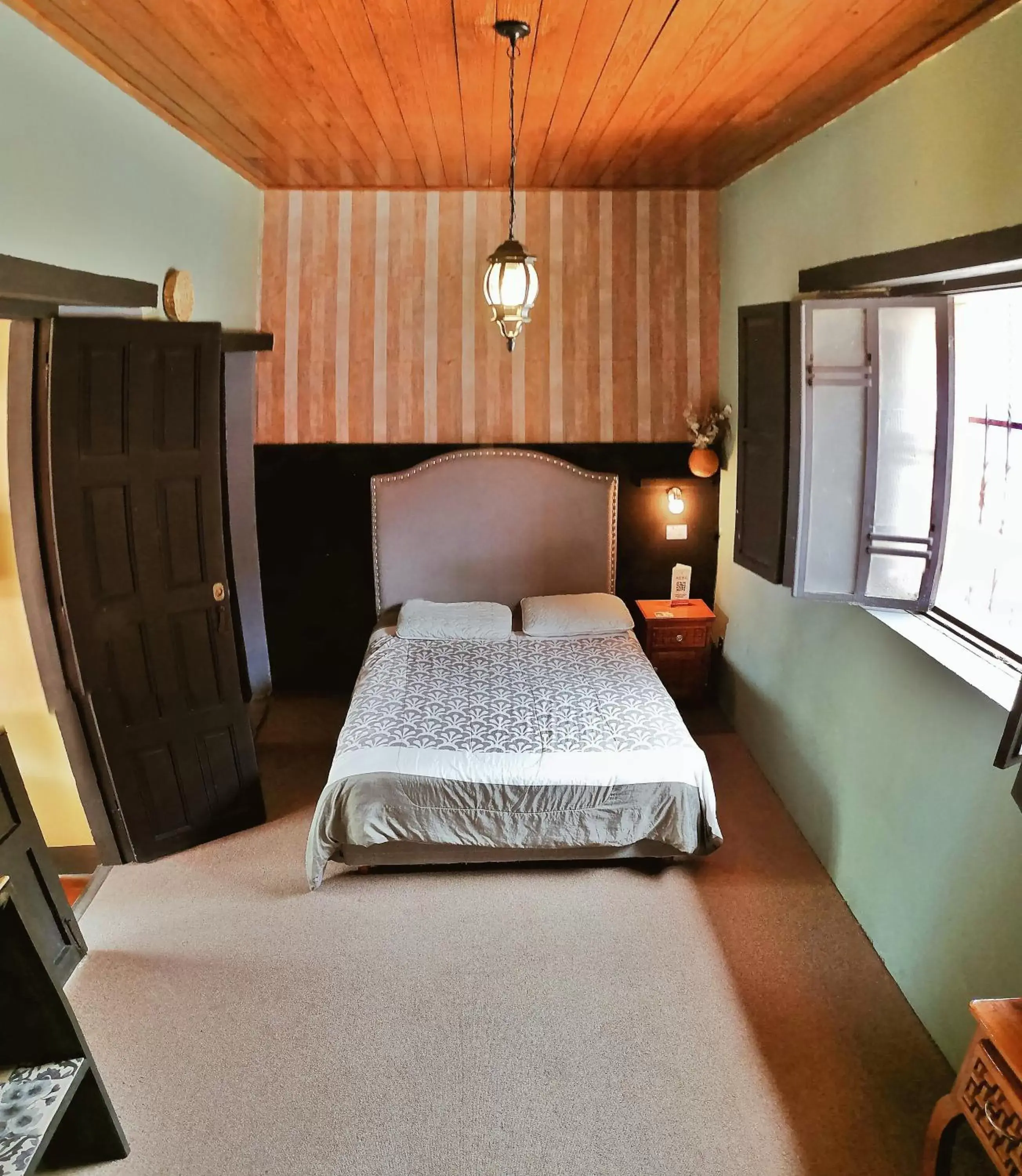 Photo of the whole room, Bed in El Naranjo Hotel Finca Urbana