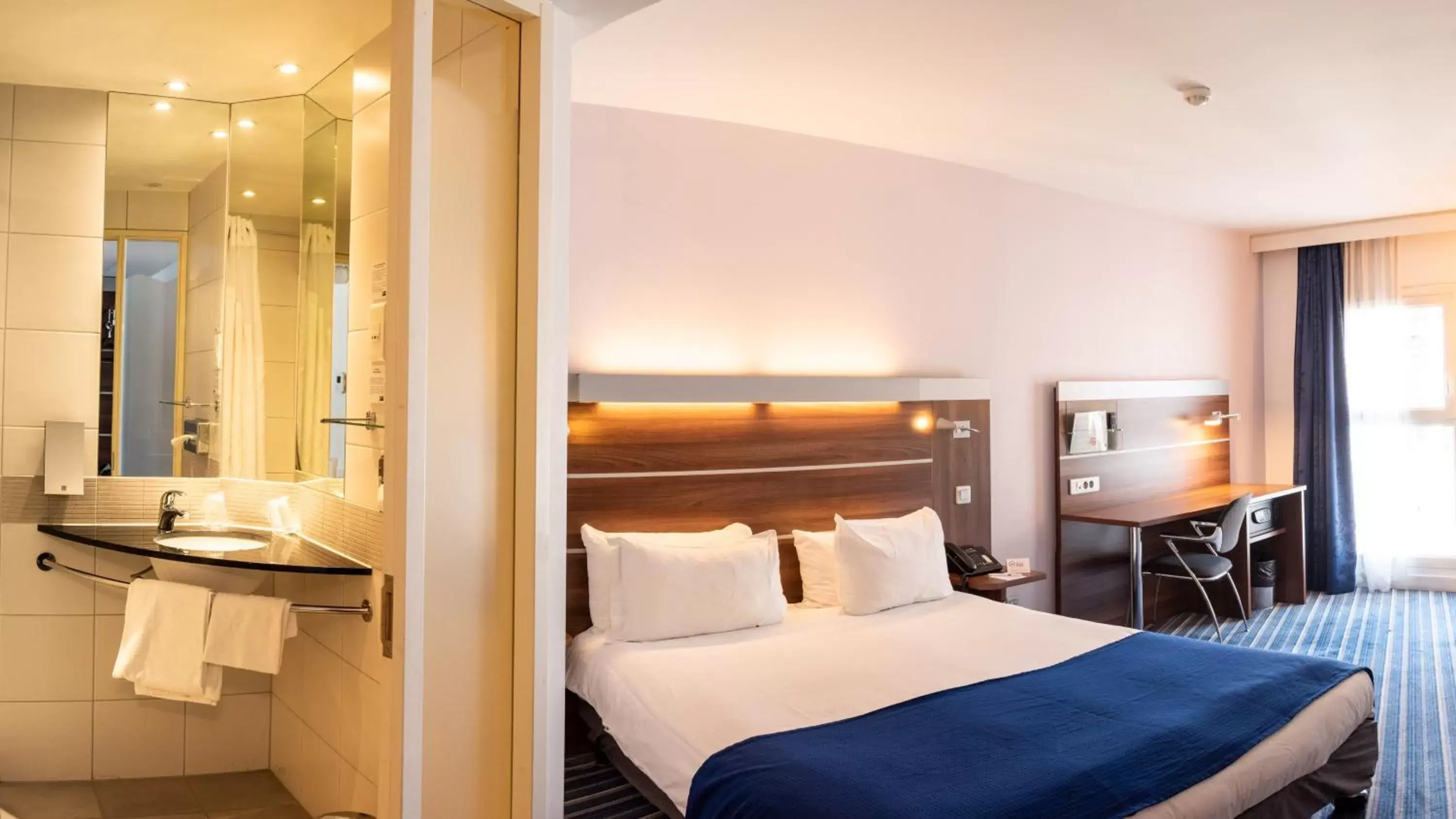 Bathroom, Bed in Holiday Inn Express Marseille Saint Charles, an IHG Hotel