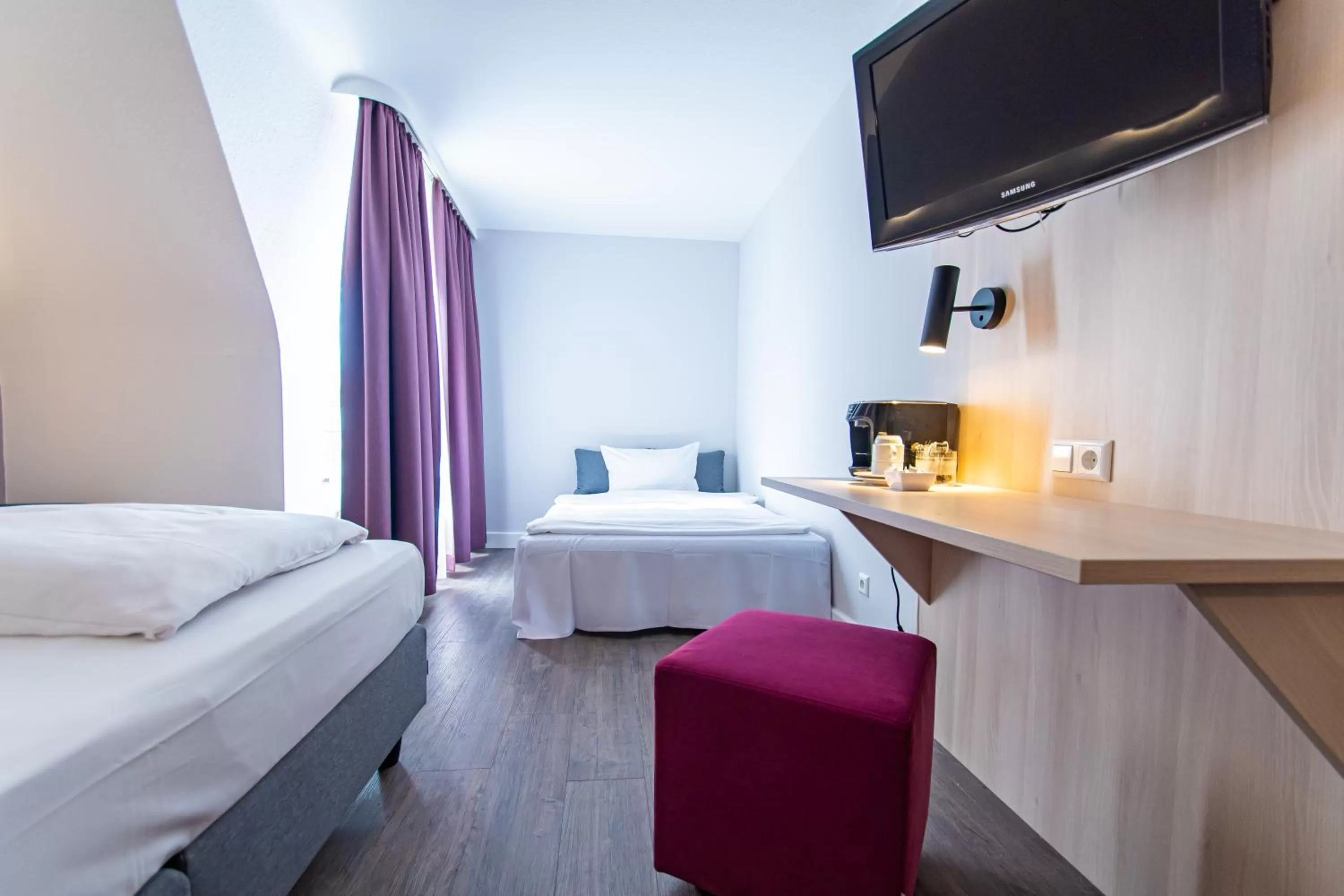 Photo of the whole room, Bed in Taste Hotel Hockenheim