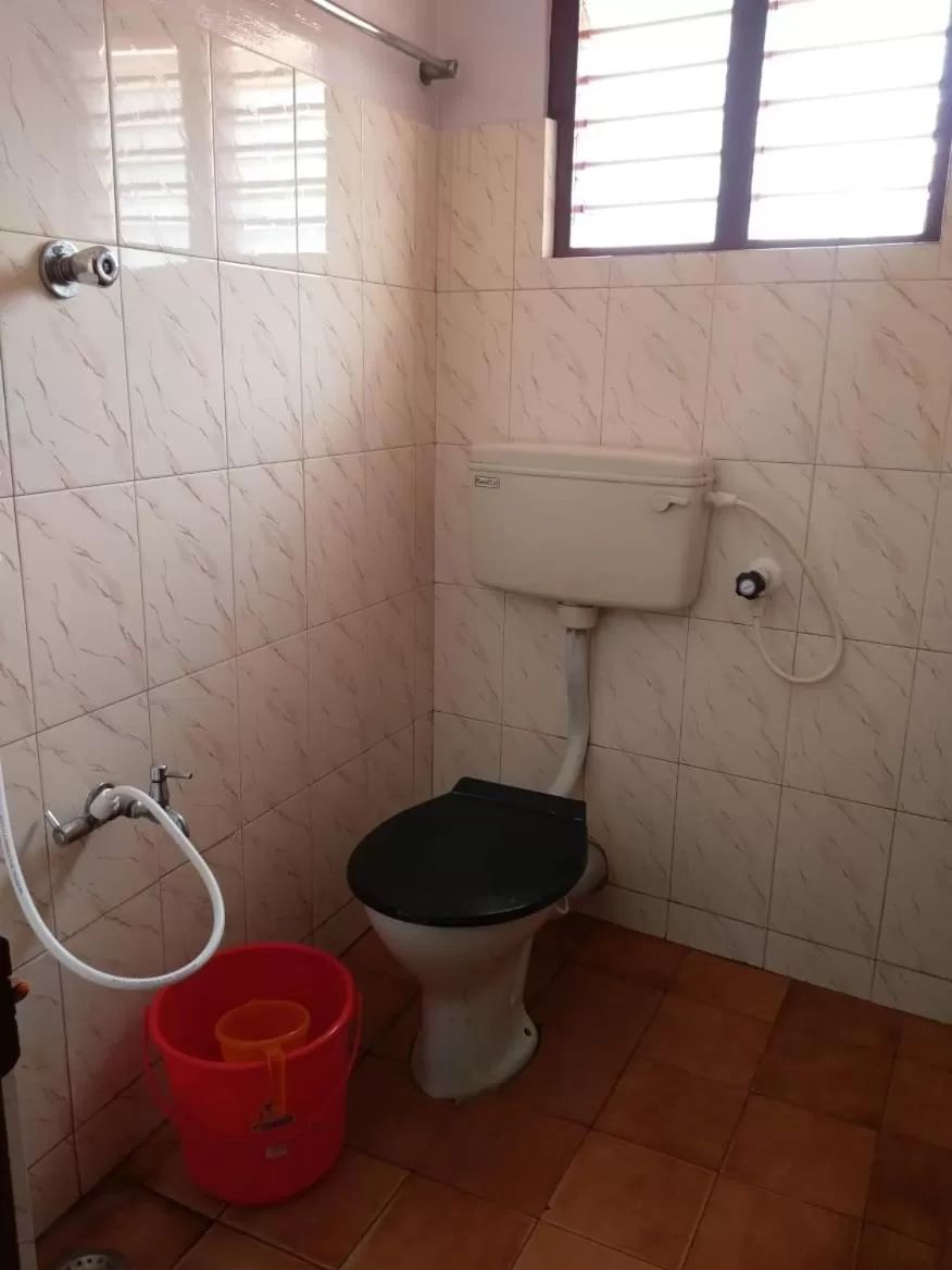 Bathroom in Anandan Tourist Home