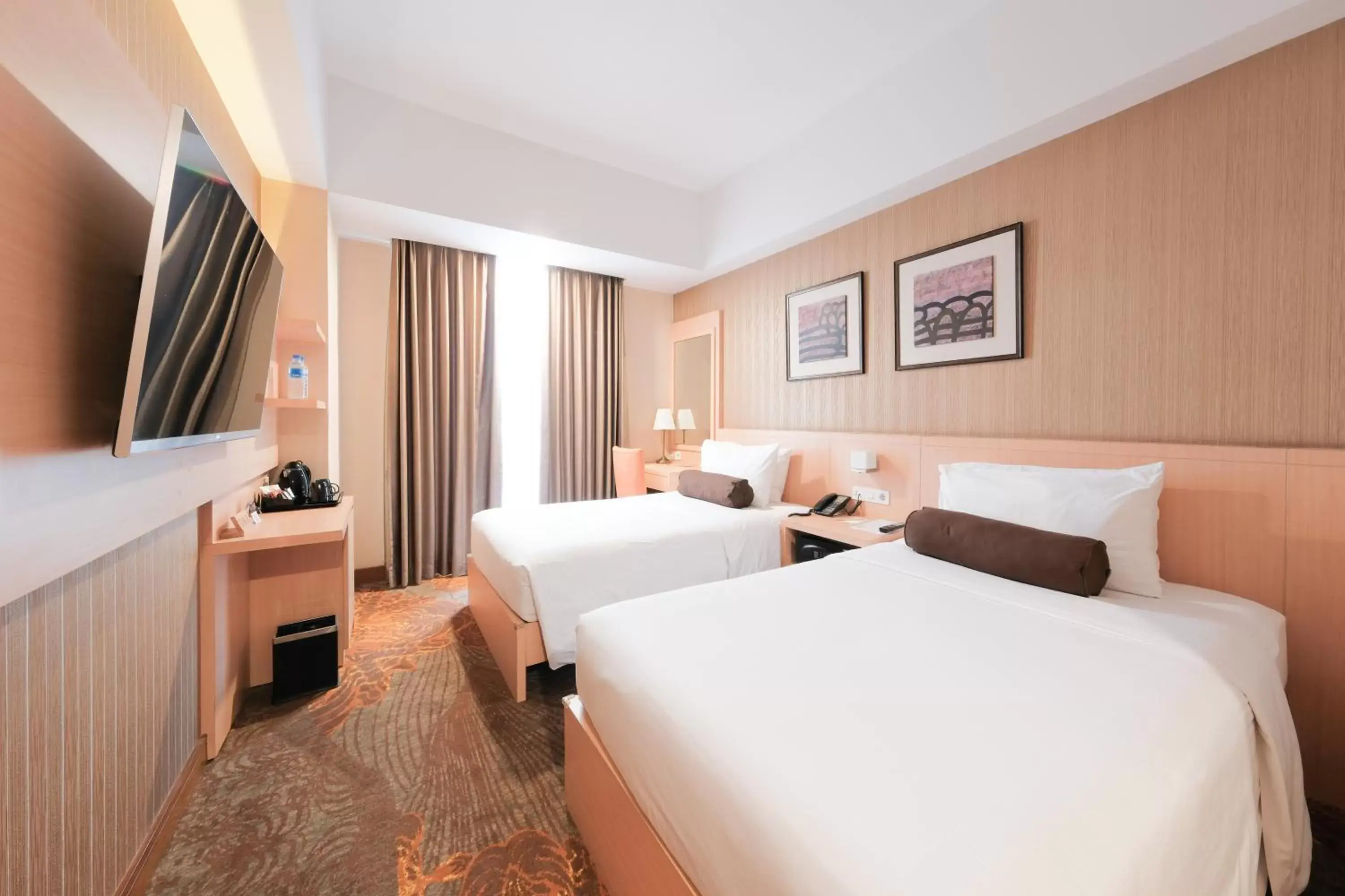 Bed in Hotel Chanti Managed by TENTREM Hotel Management Indonesia
