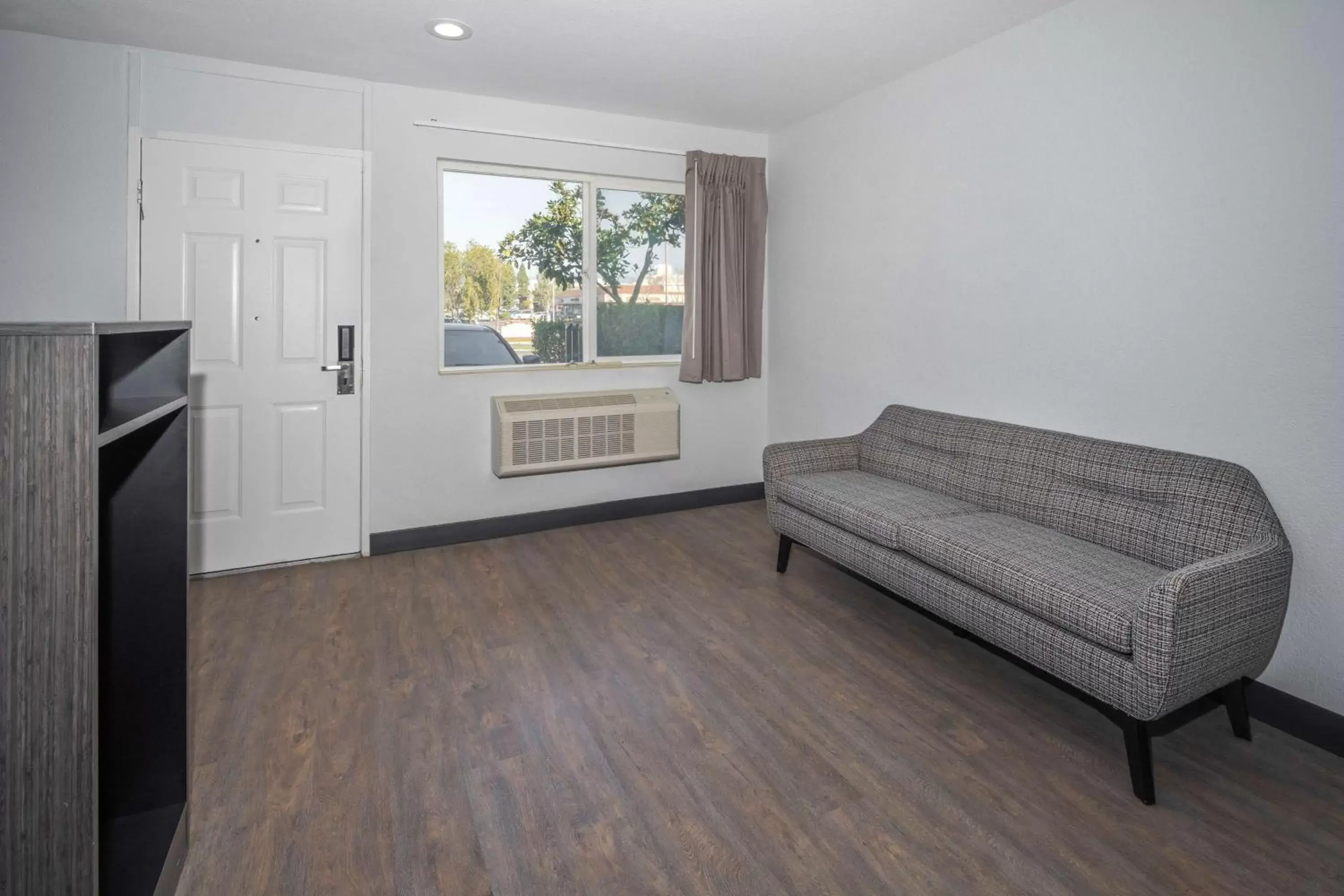 Photo of the whole room, Seating Area in Motel 6-Fontana, CA