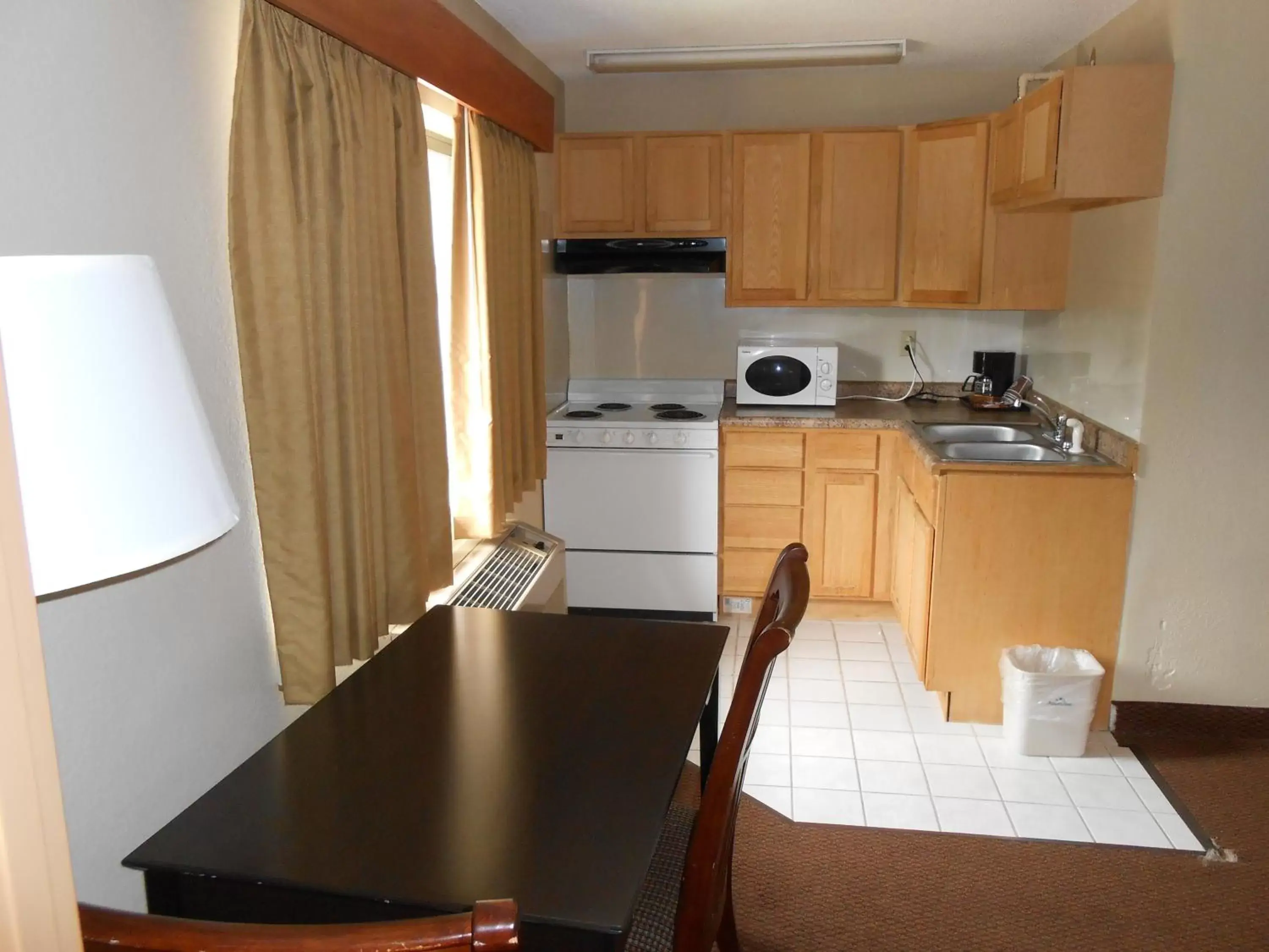 Kitchen or kitchenette, Kitchen/Kitchenette in AmericInn by Wyndham Ham Lake