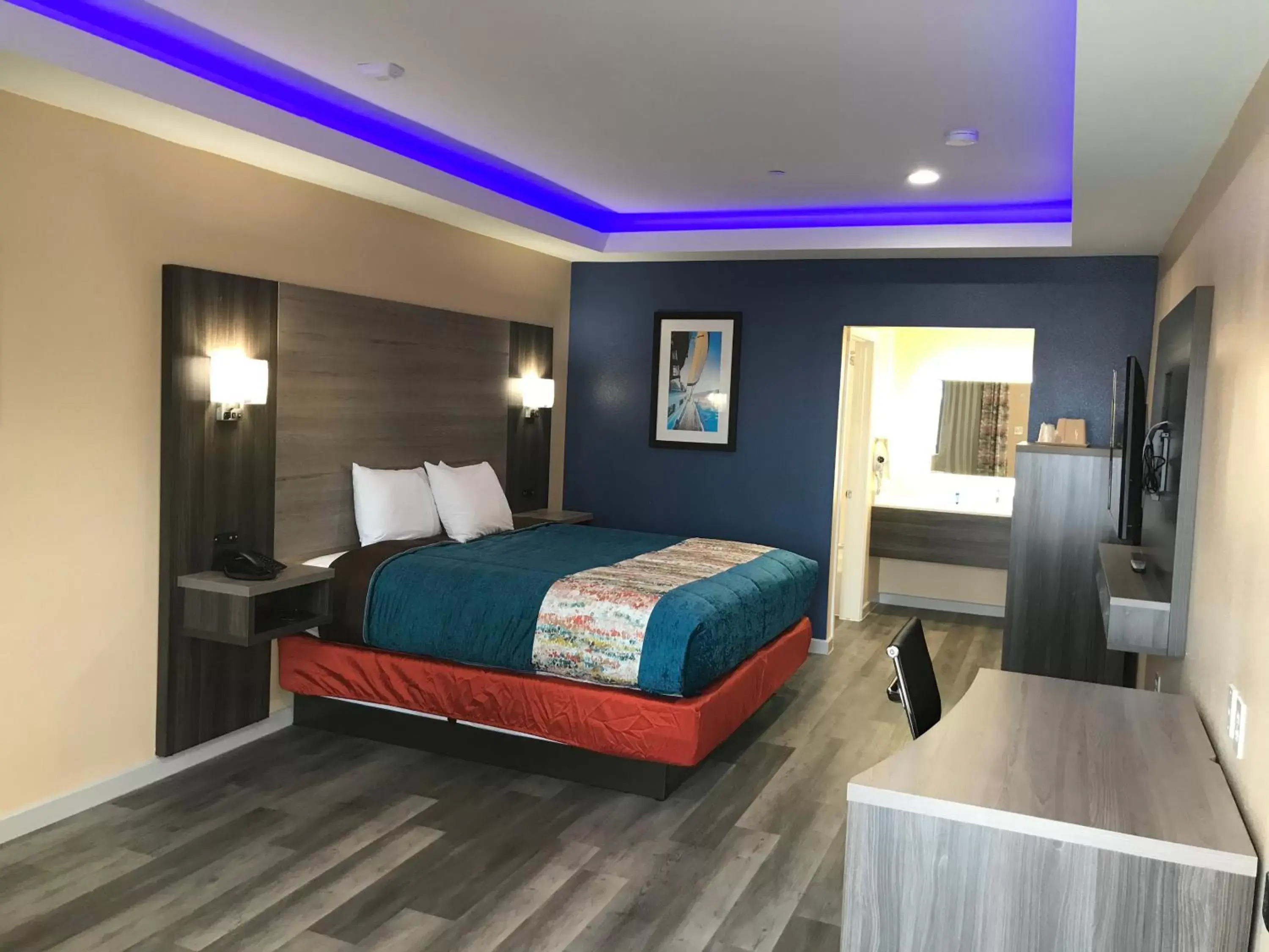 Bed in Scottish Inn & Suites Houston Willowbrook