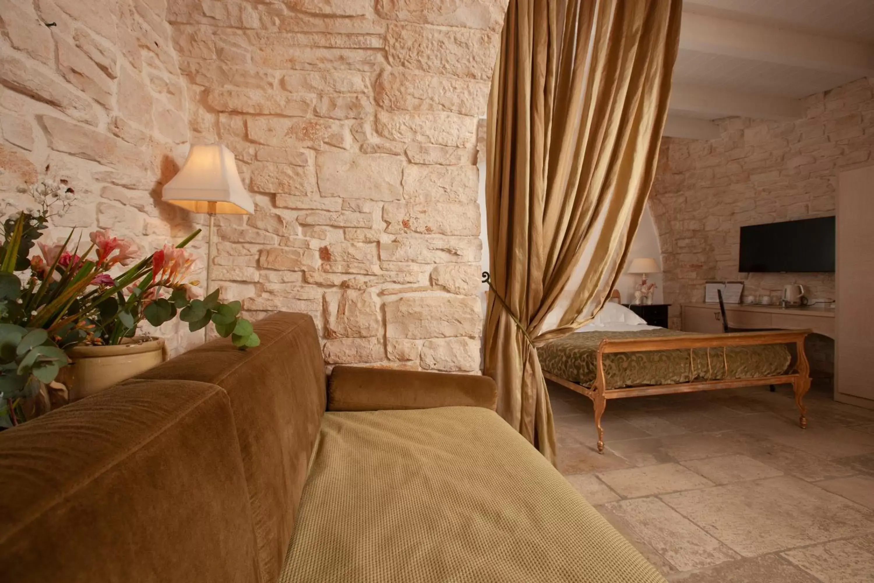 Bed, Seating Area in Le Alcove-Luxury Hotel nei Trulli