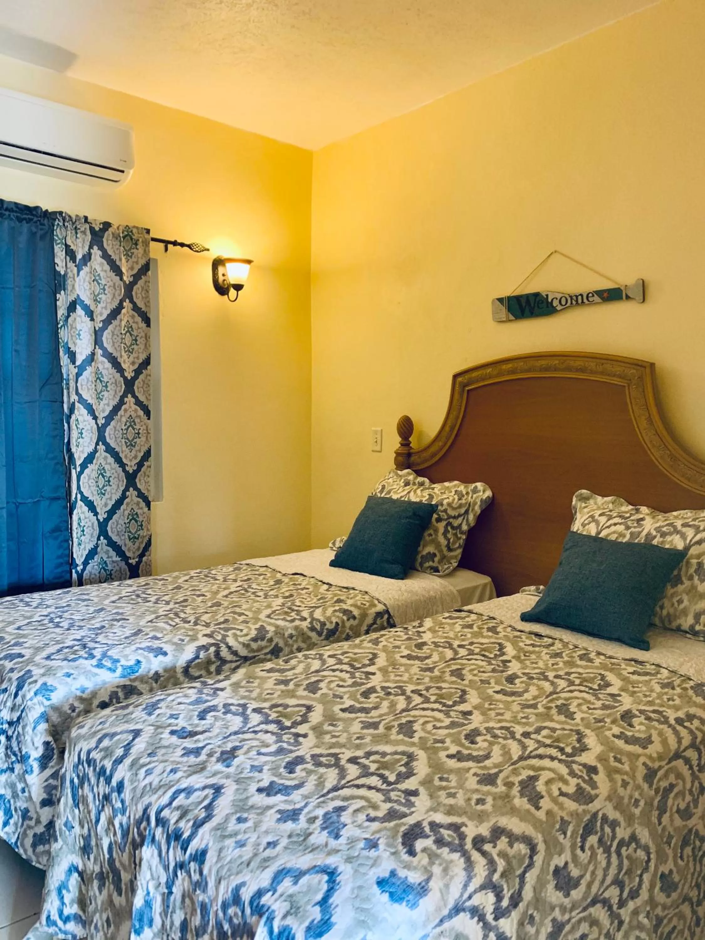 Bed in Connie's Comfort Suites