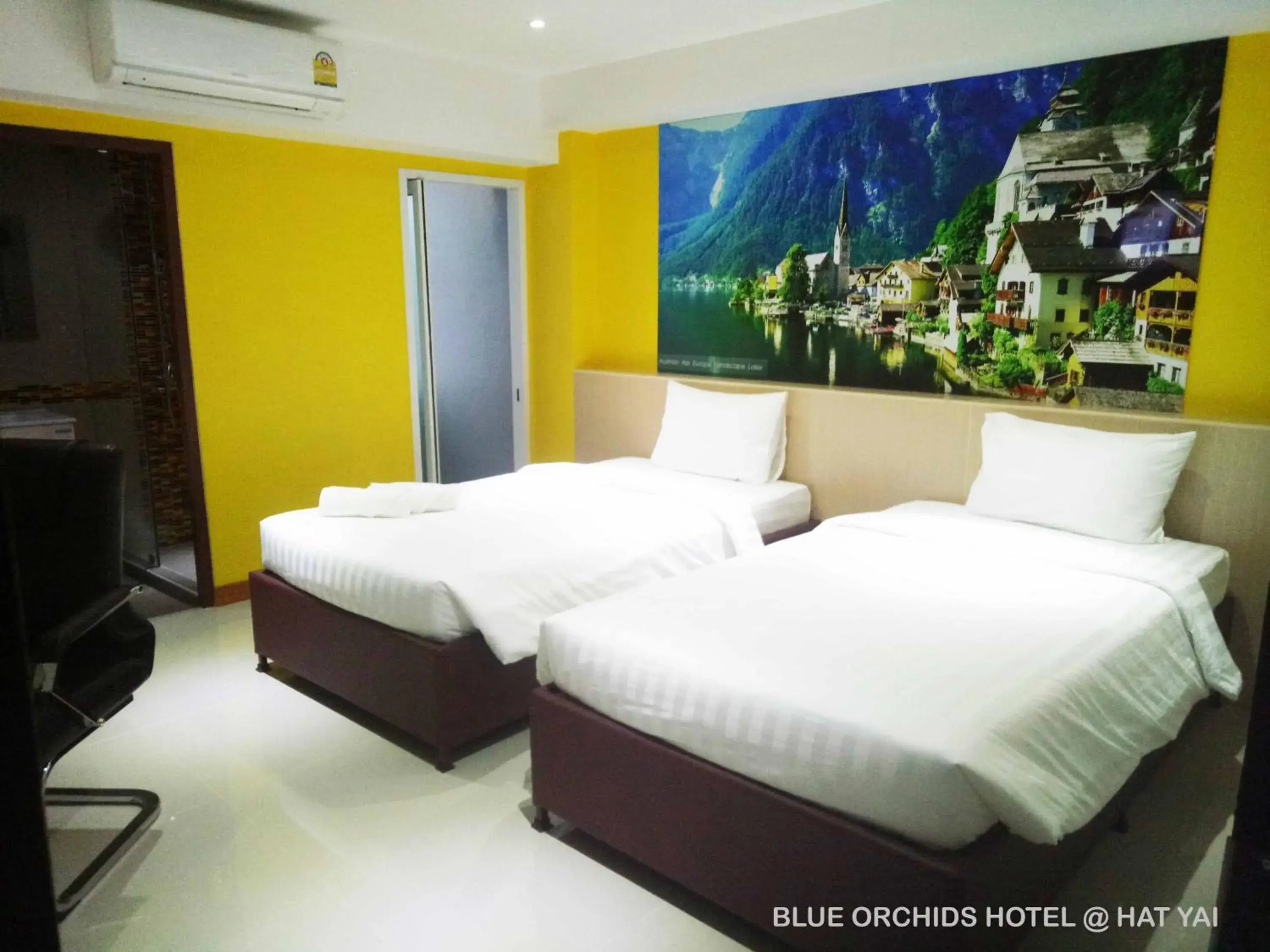 Bed in Blue Orchids Hotel