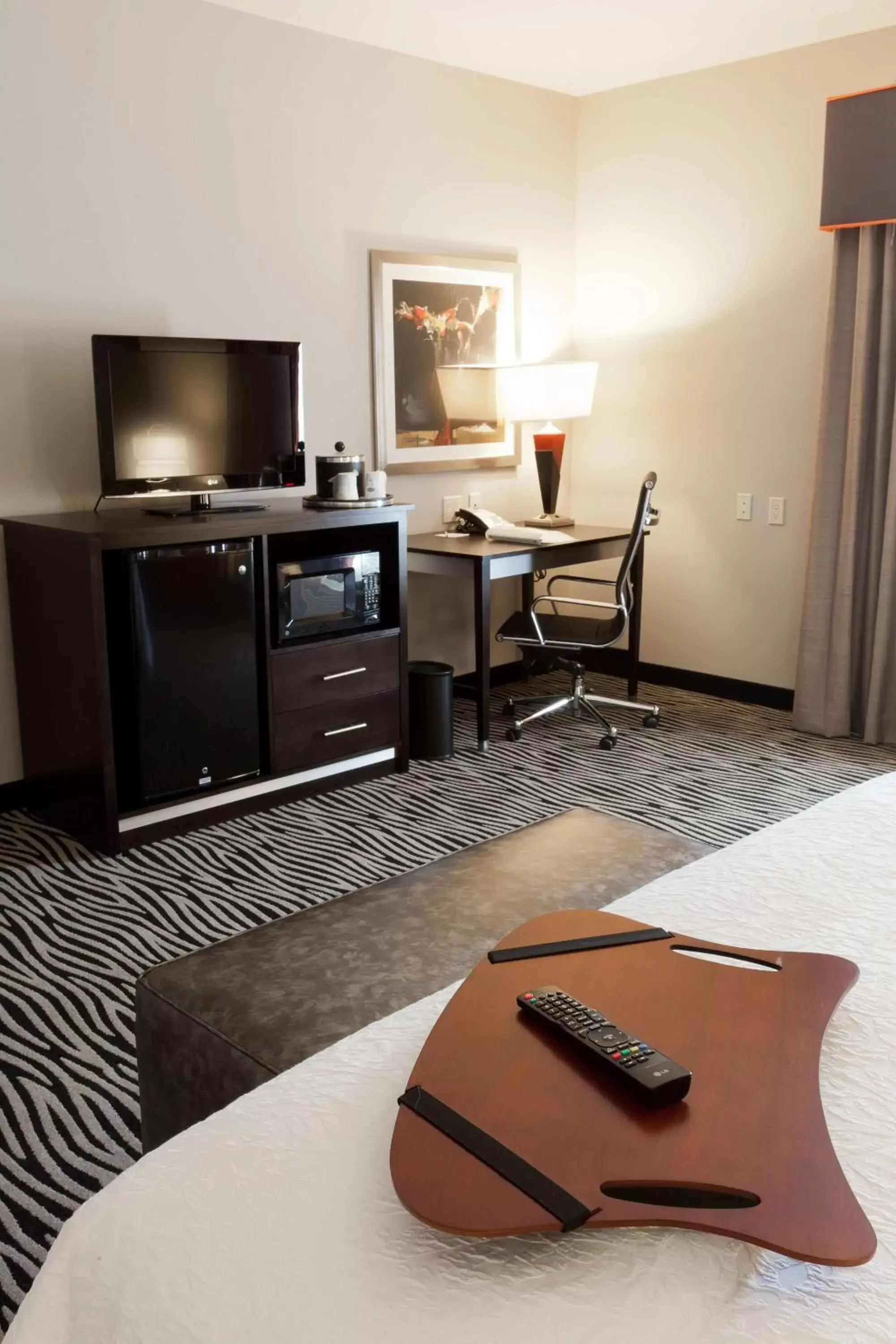 Bed, TV/Entertainment Center in Hampton Inn and Suites Tulsa Central