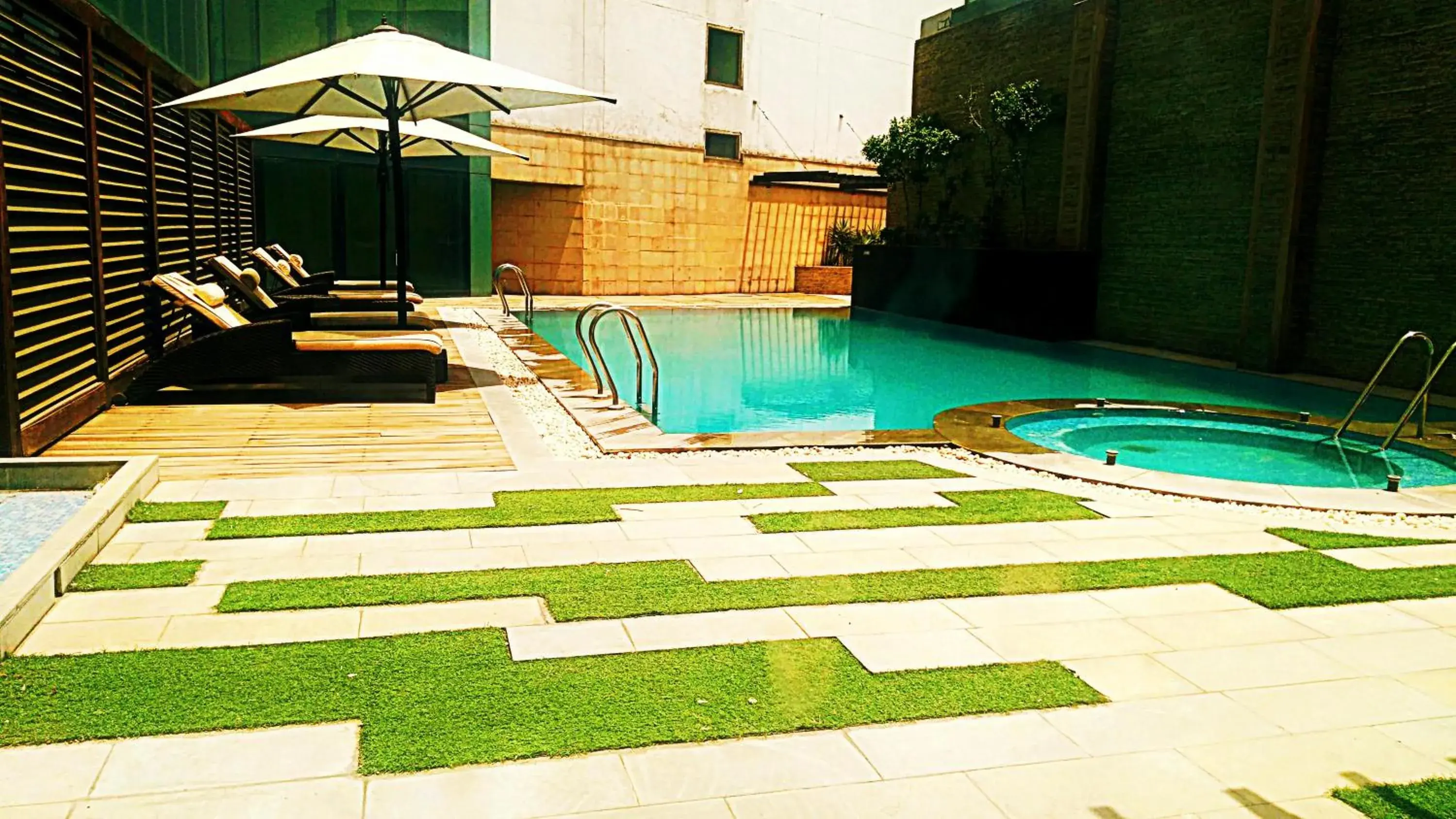 Swimming pool in Savoy Suites Greater Noida