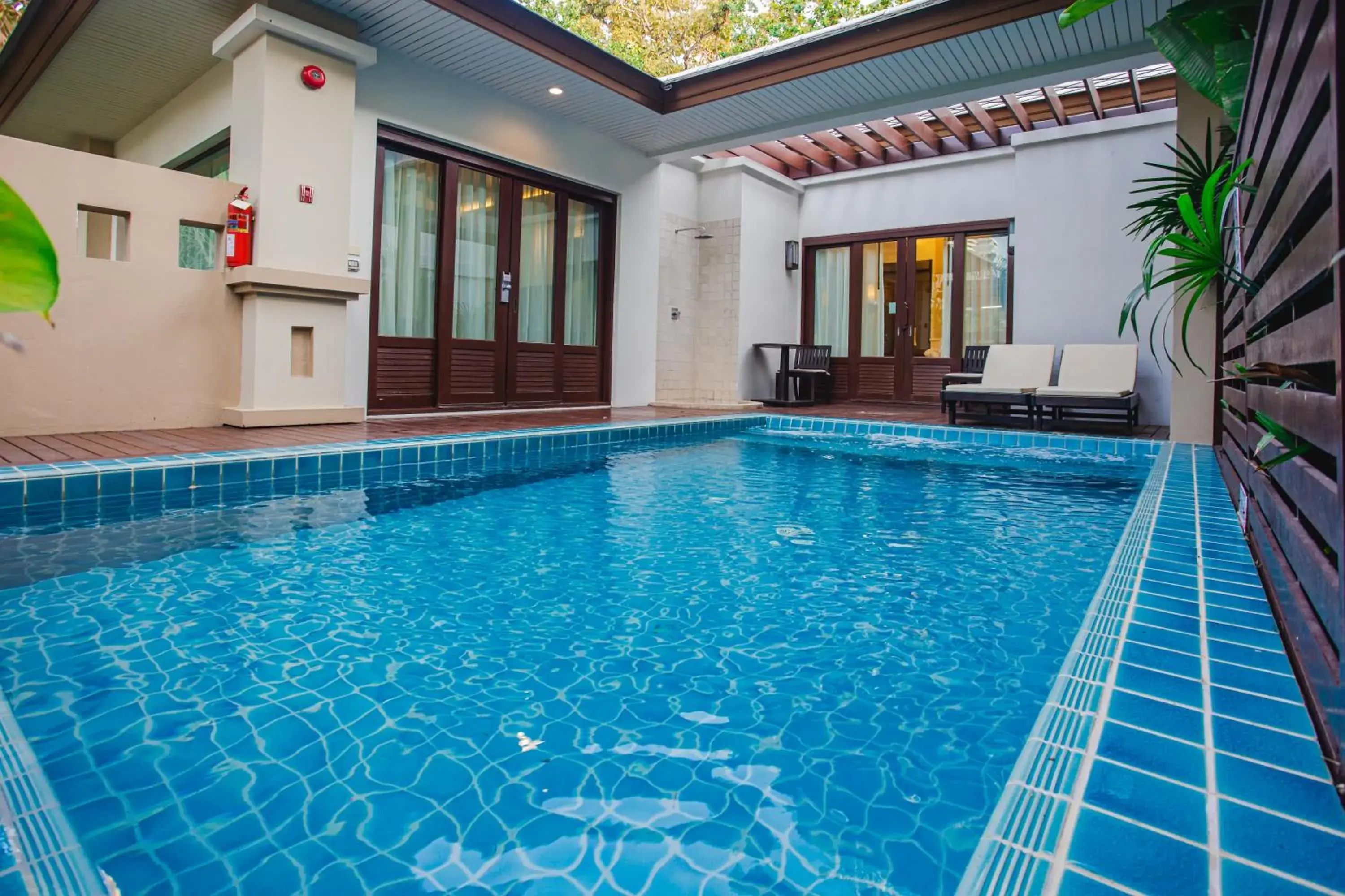 Swimming pool in Ravindra Beach Resort & Spa - SHA Extra Plus