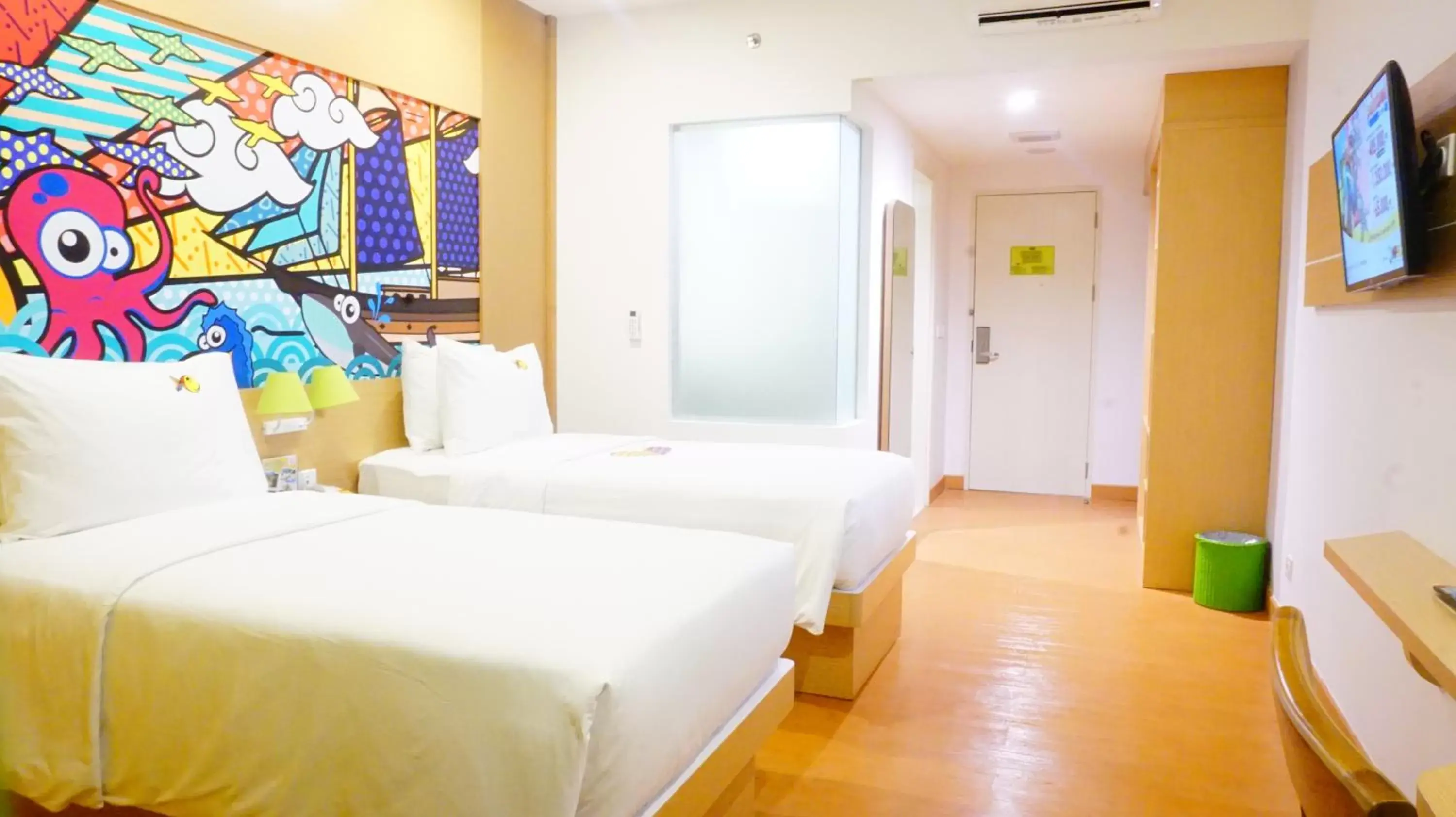 Bed in MaxOneHotels at Resort Makassar