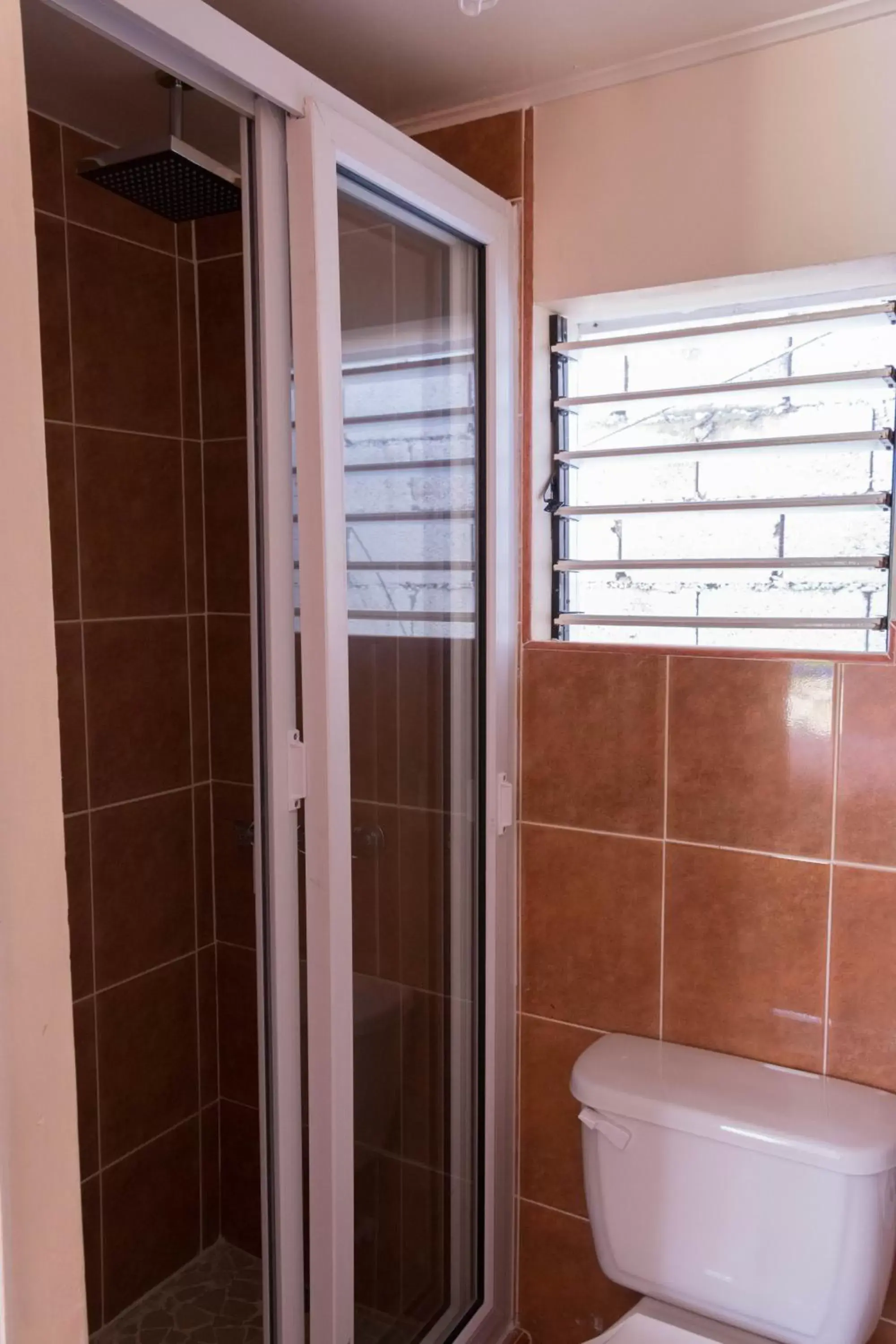 Shower, Bathroom in Travellers Beach Resort