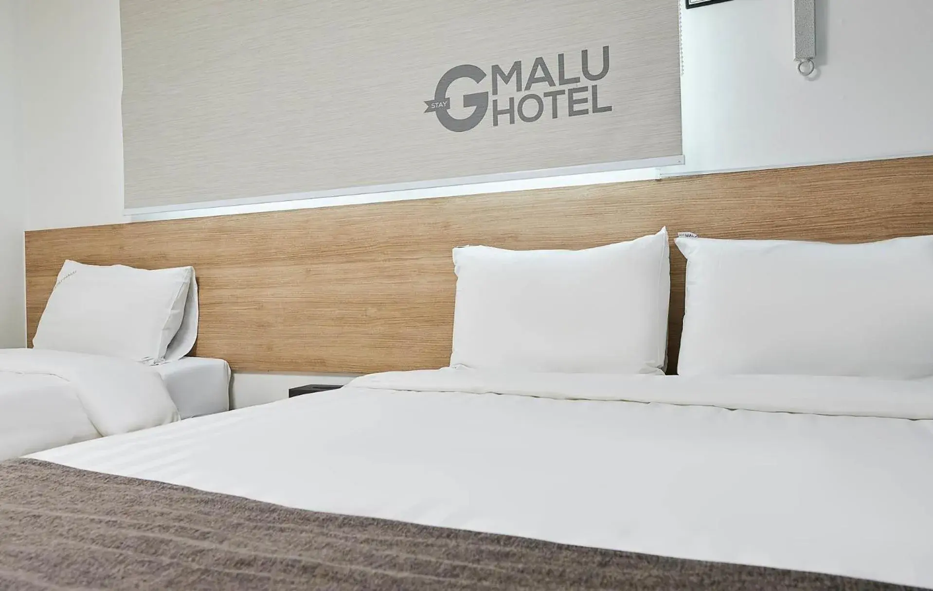 Bed in G Stay Malu Hotel