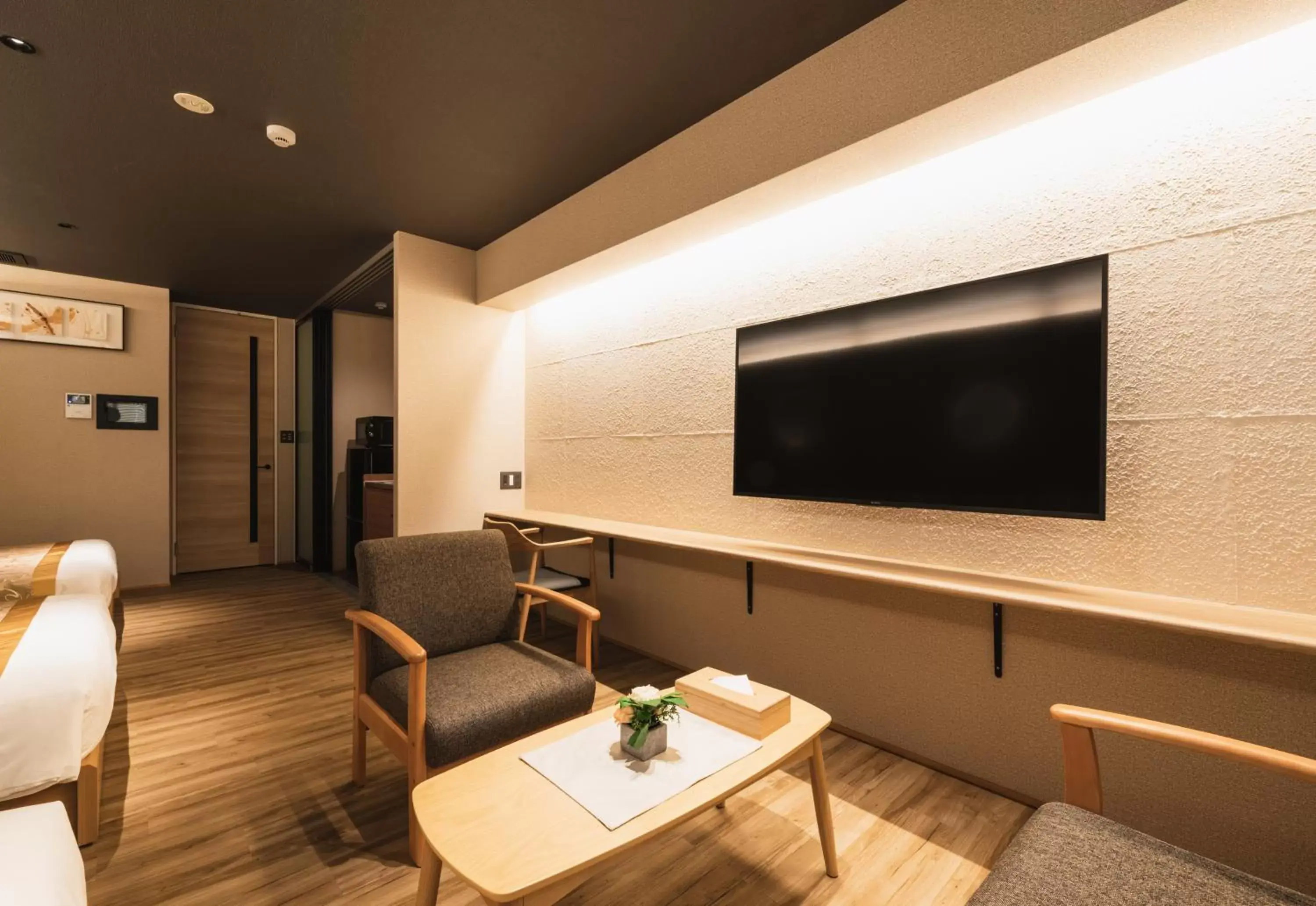 Photo of the whole room, TV/Entertainment Center in GRAND BASE Beppu Ekihigashi