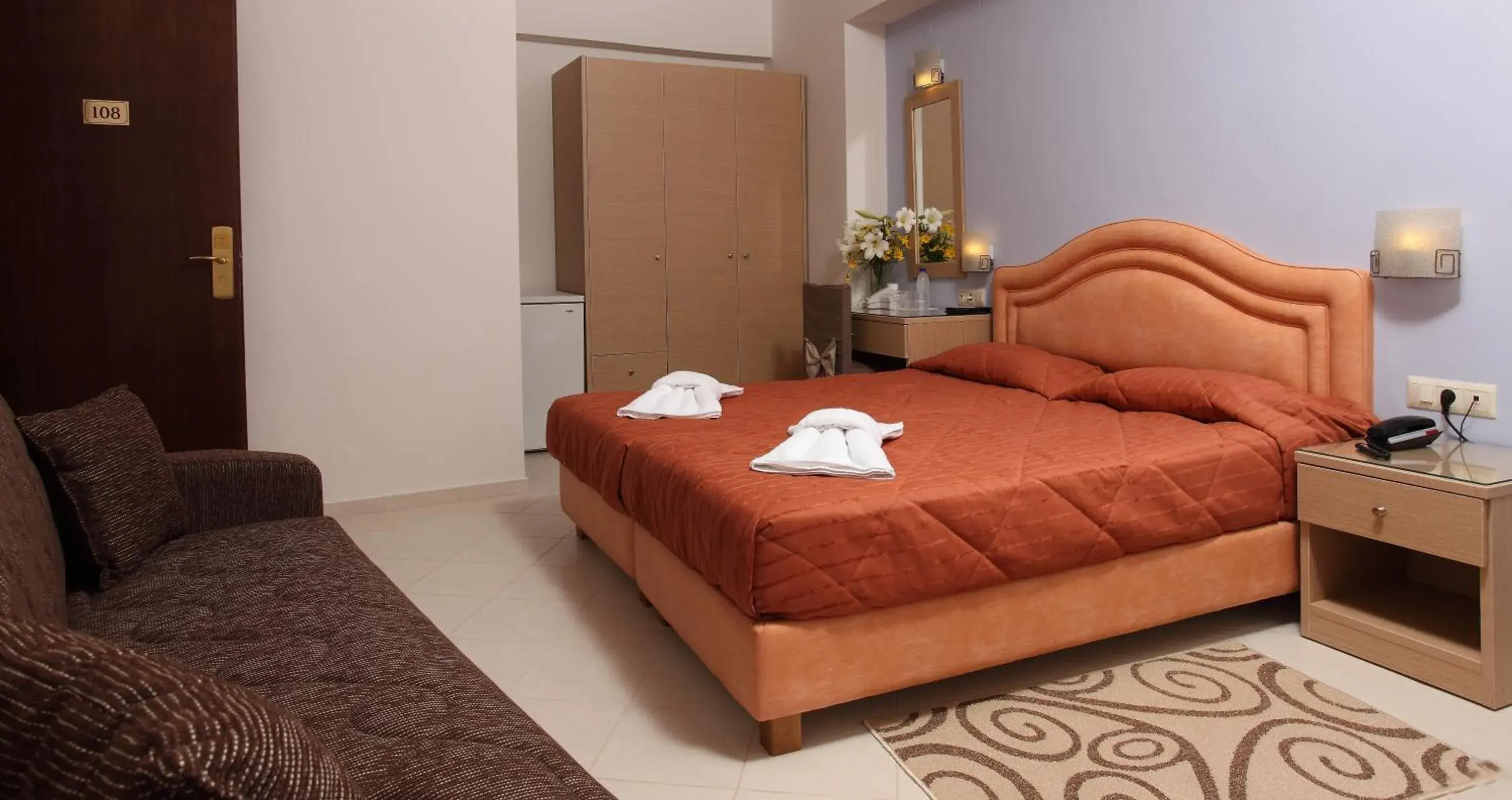 Bed in Kronos Hotel