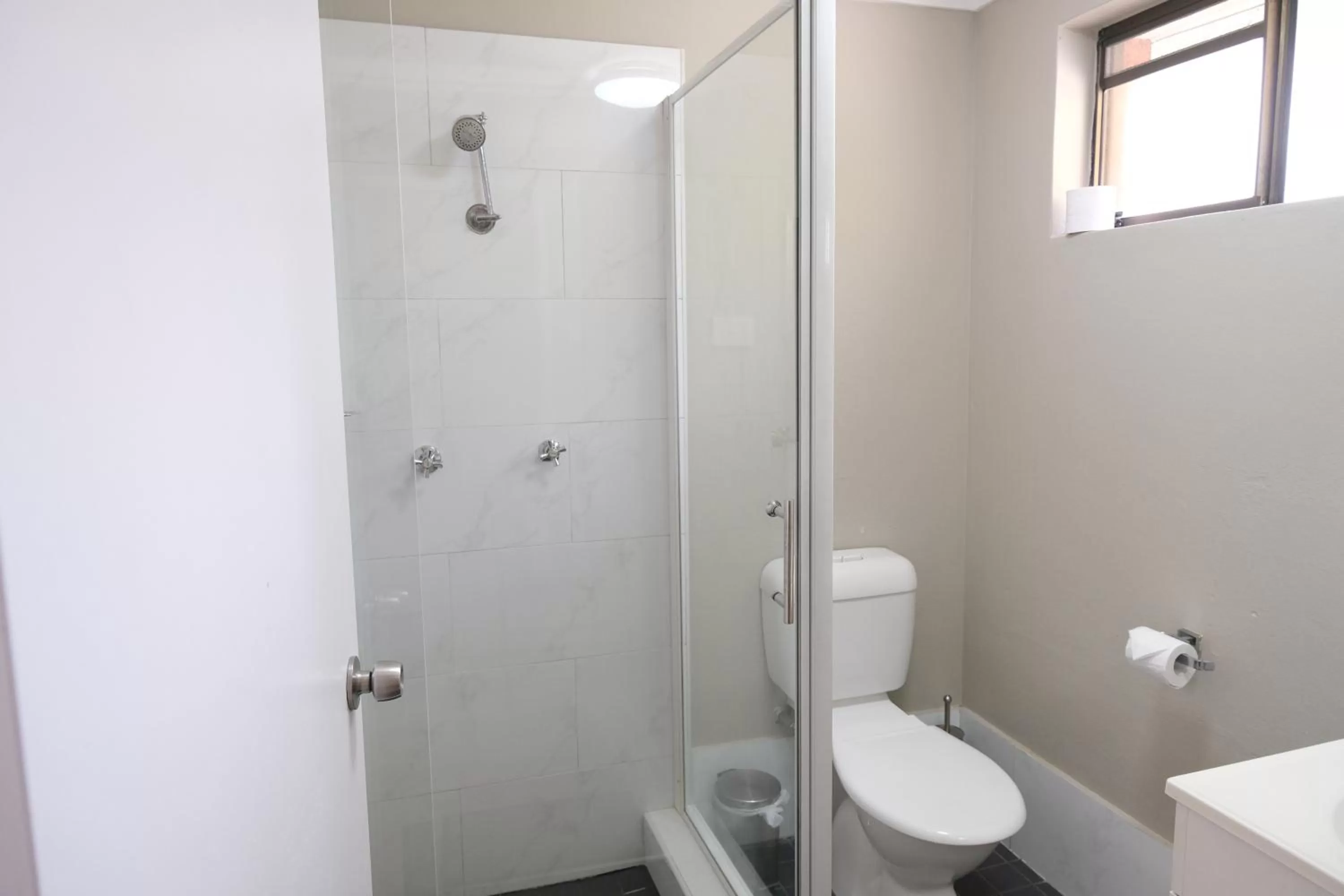 Toilet in Sapphire Palms Motel