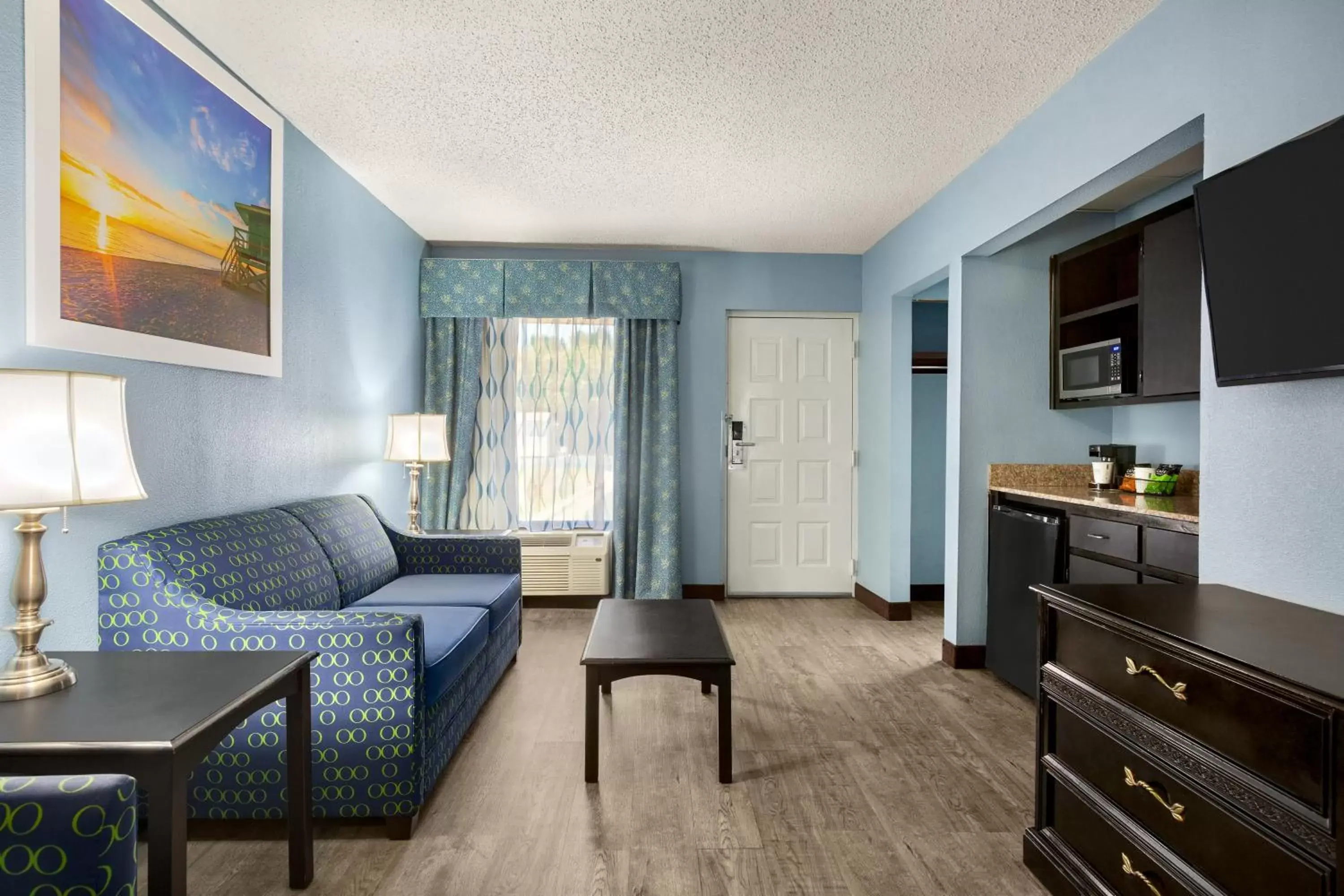 TV and multimedia, Seating Area in Days Inn by Wyndham Weldon Roanoke Rapids