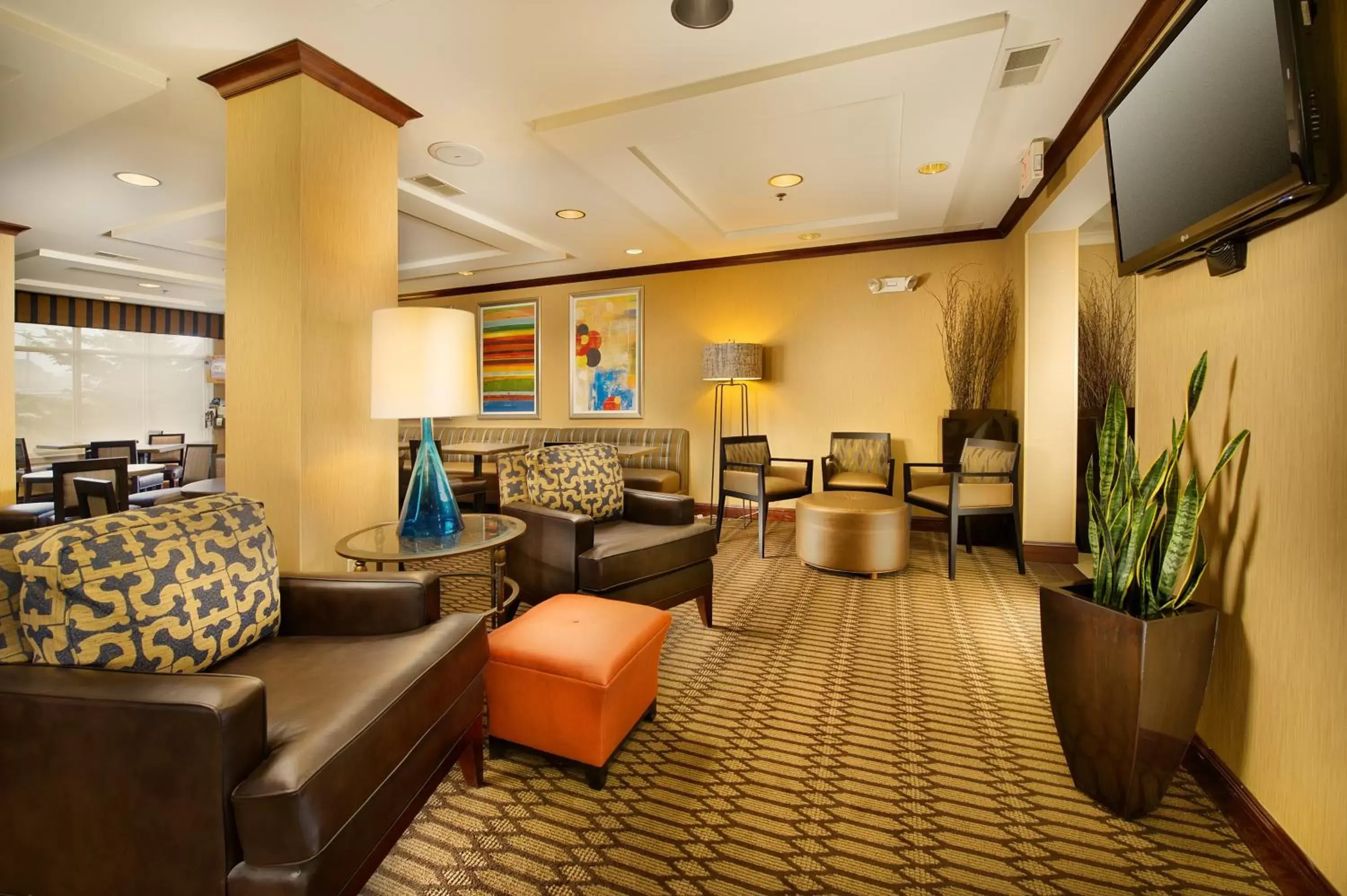 Property building, Seating Area in Holiday Inn Express & Suites by IHG Chambersburg, an IHG Hotel