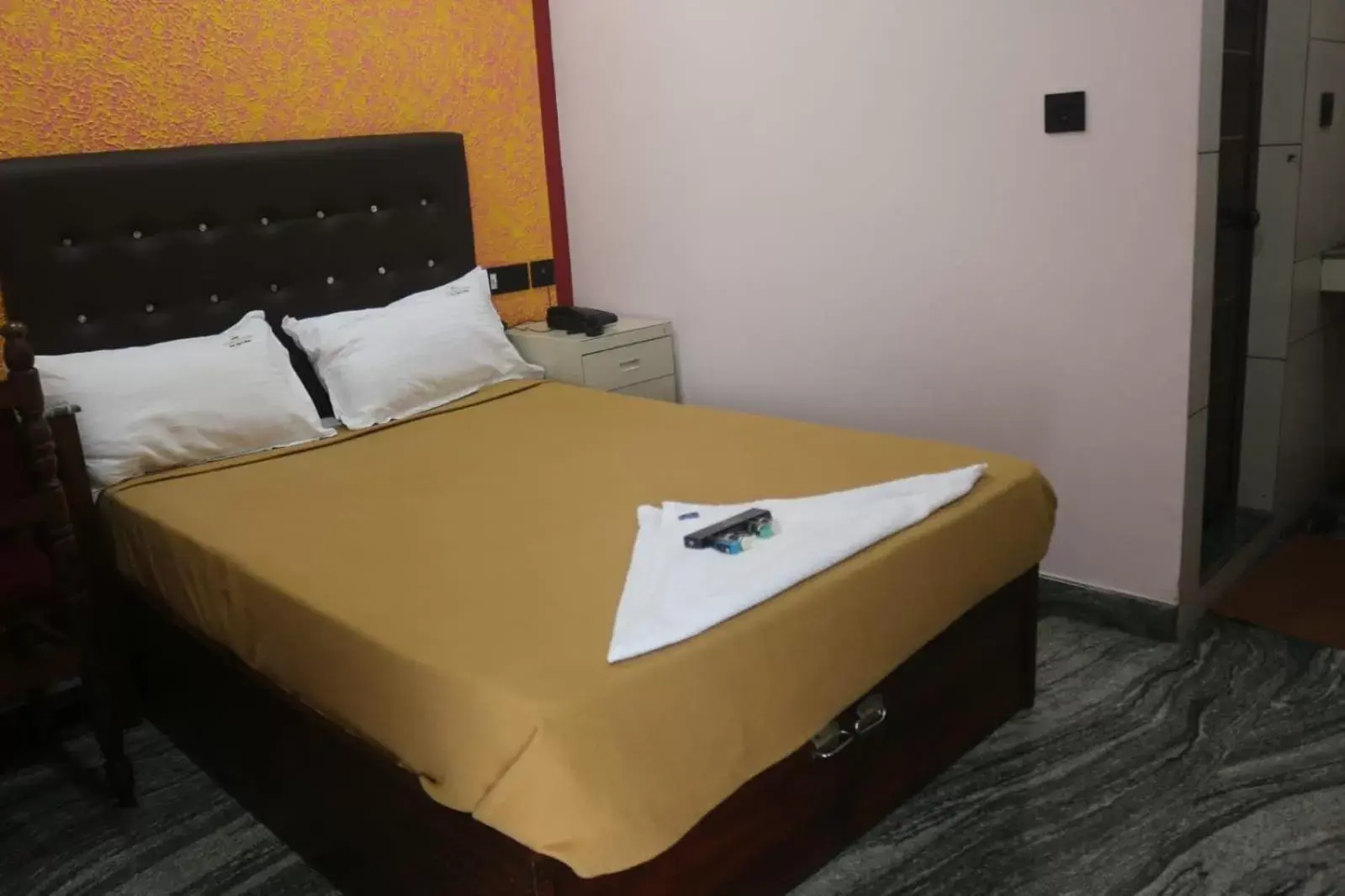 Bed in Hotel Wayanad Stay