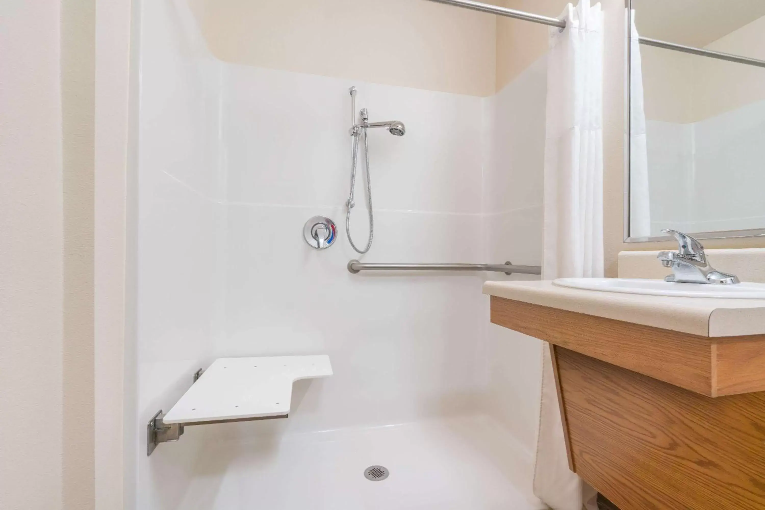 Shower, Bathroom in Days Inn & Suites by Wyndham Rochester South