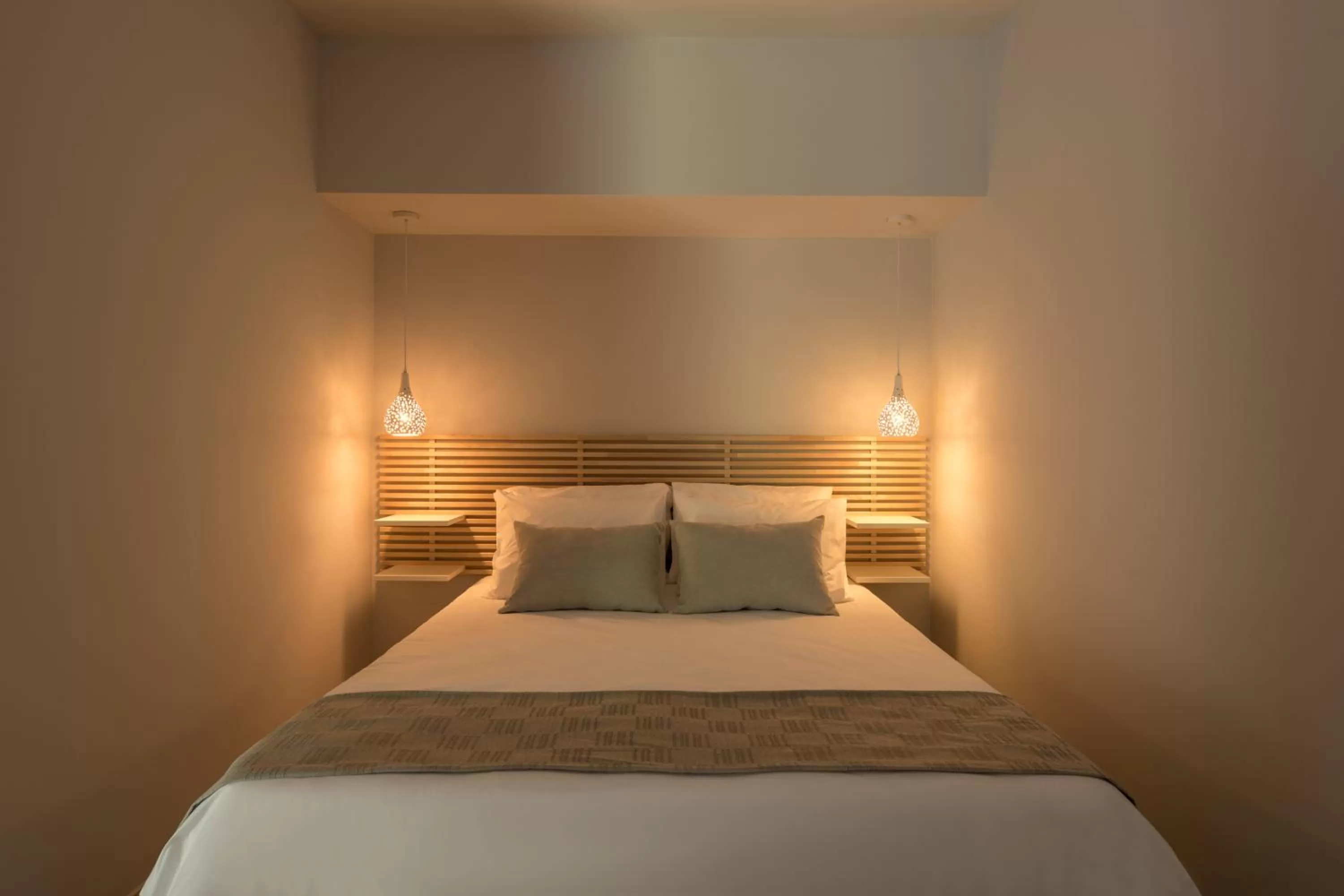 Bed in 12 Keys Athens Apartments