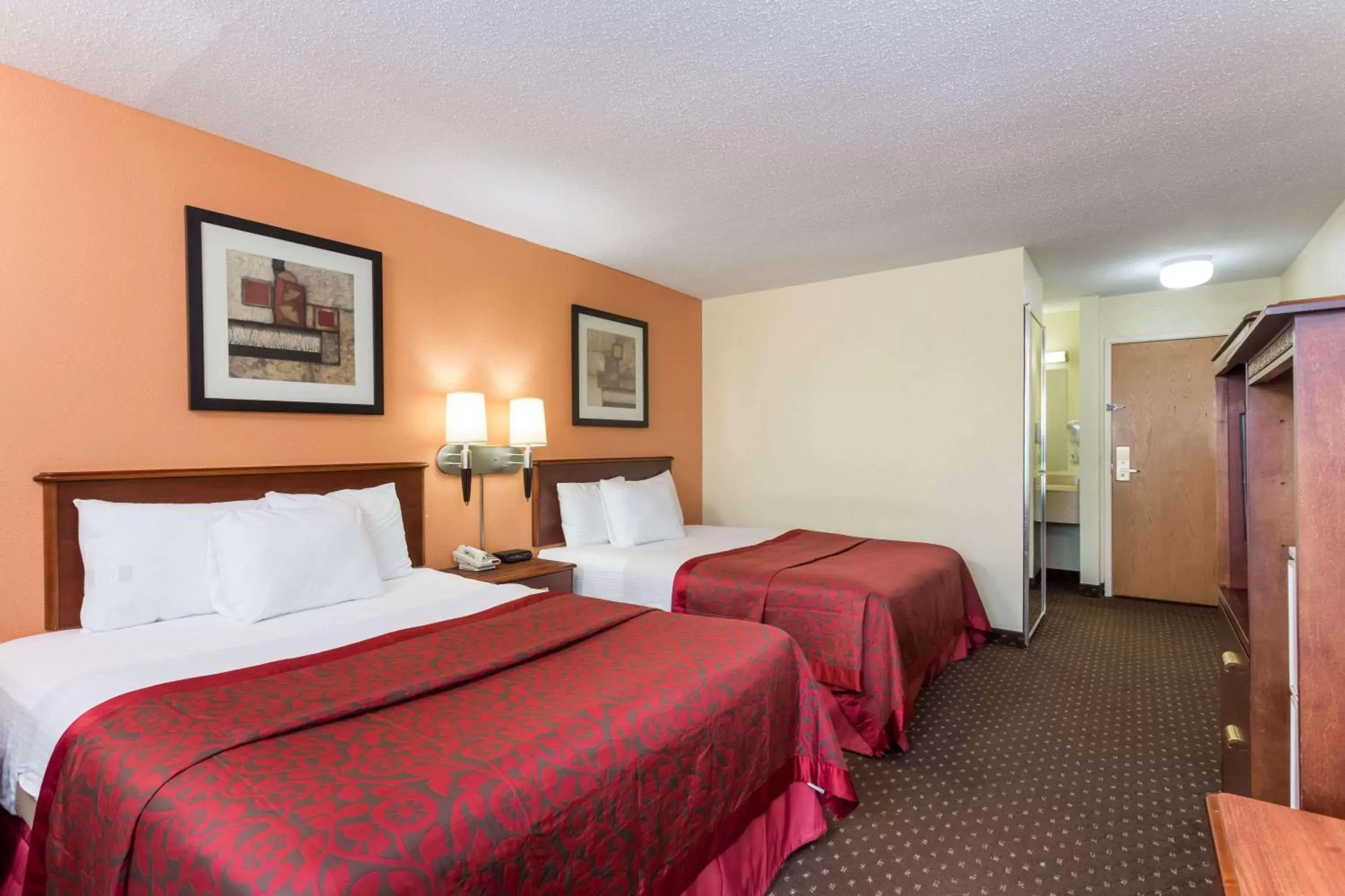 Photo of the whole room, Bed in Days Inn & Suites by Wyndham Bloomington/Normal IL
