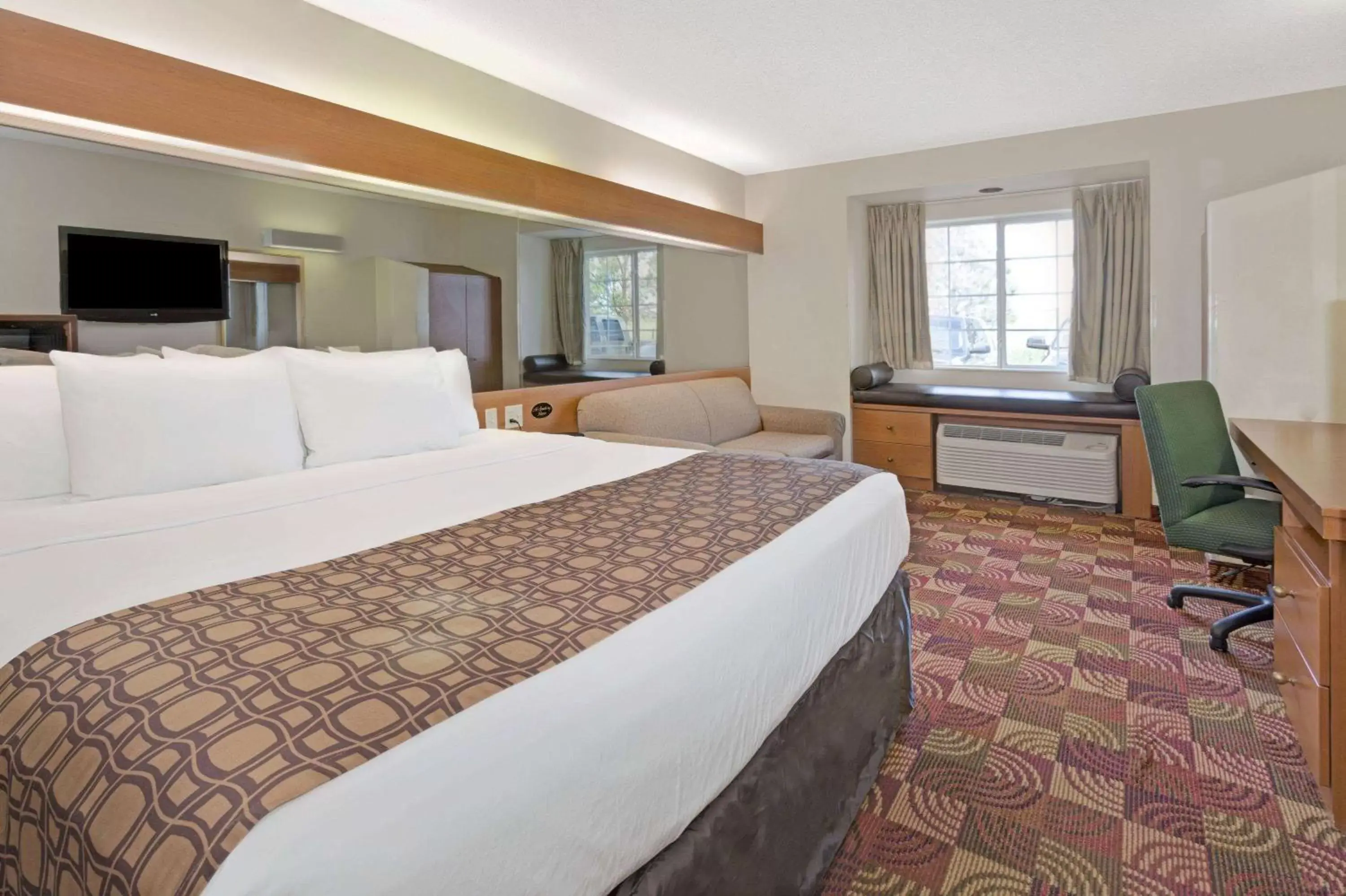 Photo of the whole room, Bed in Microtel Inn & Suites by Wyndham Denver Airport